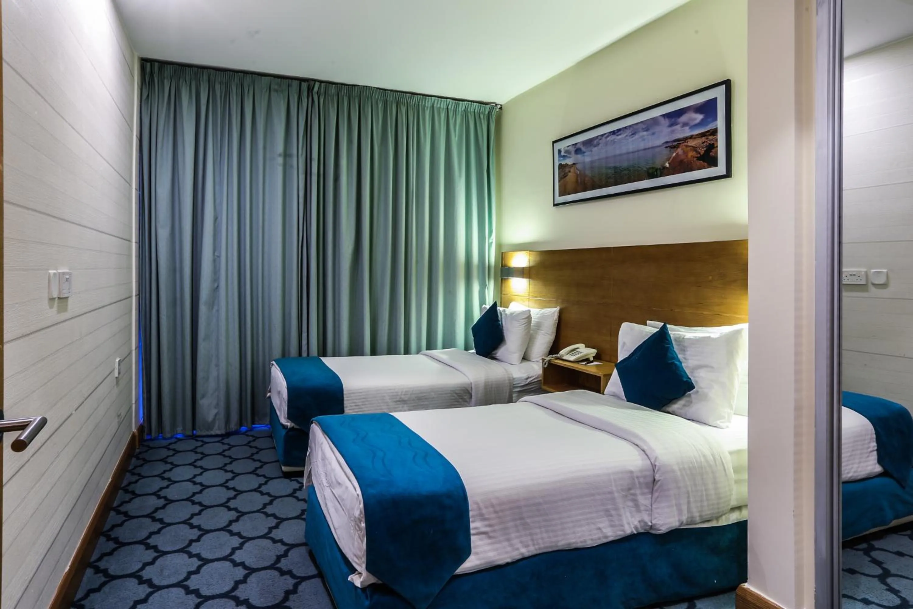 Bed in Khuttar Apartment