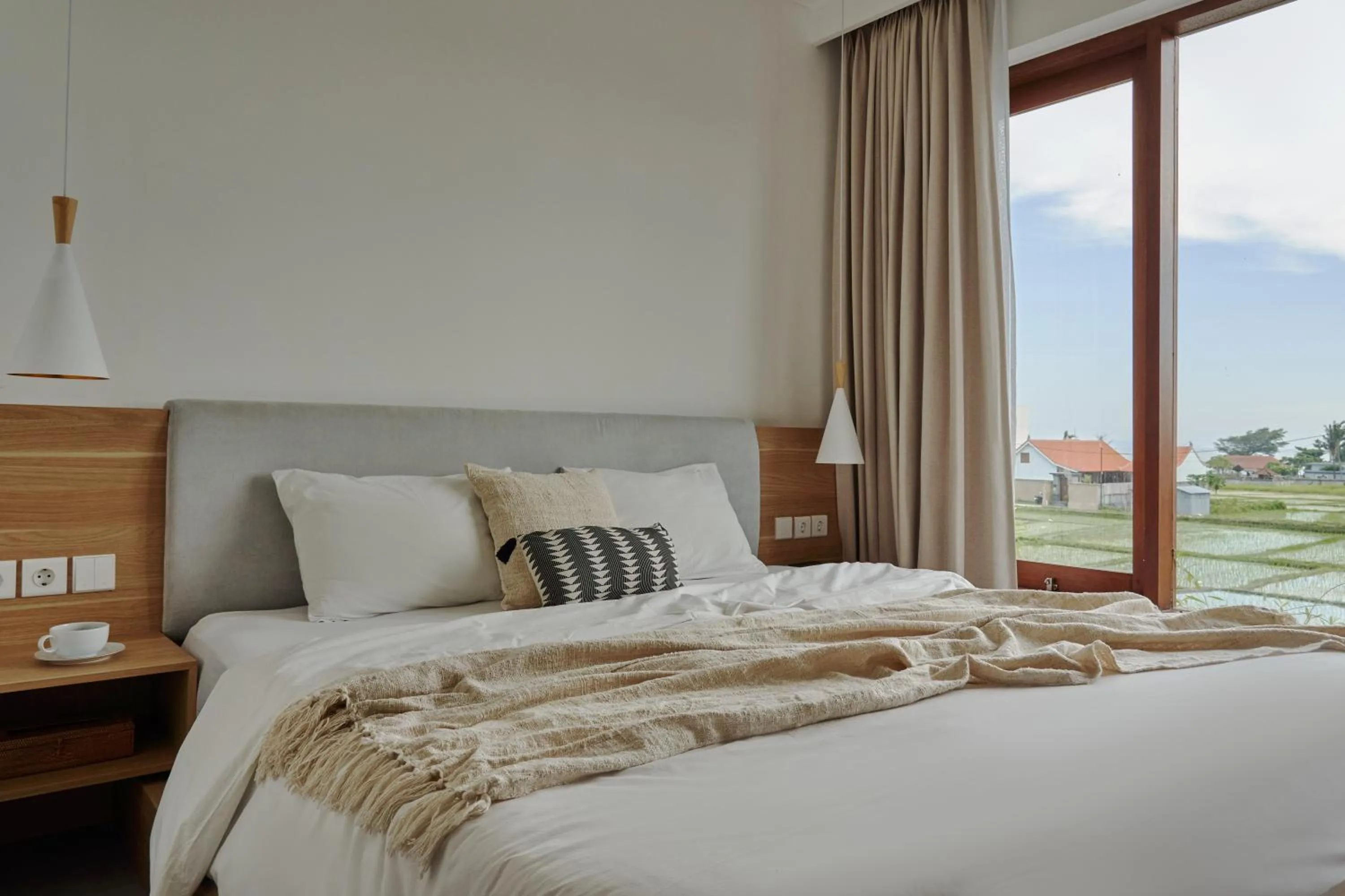 Bed in Om Cemagi Beach Villa Canggu