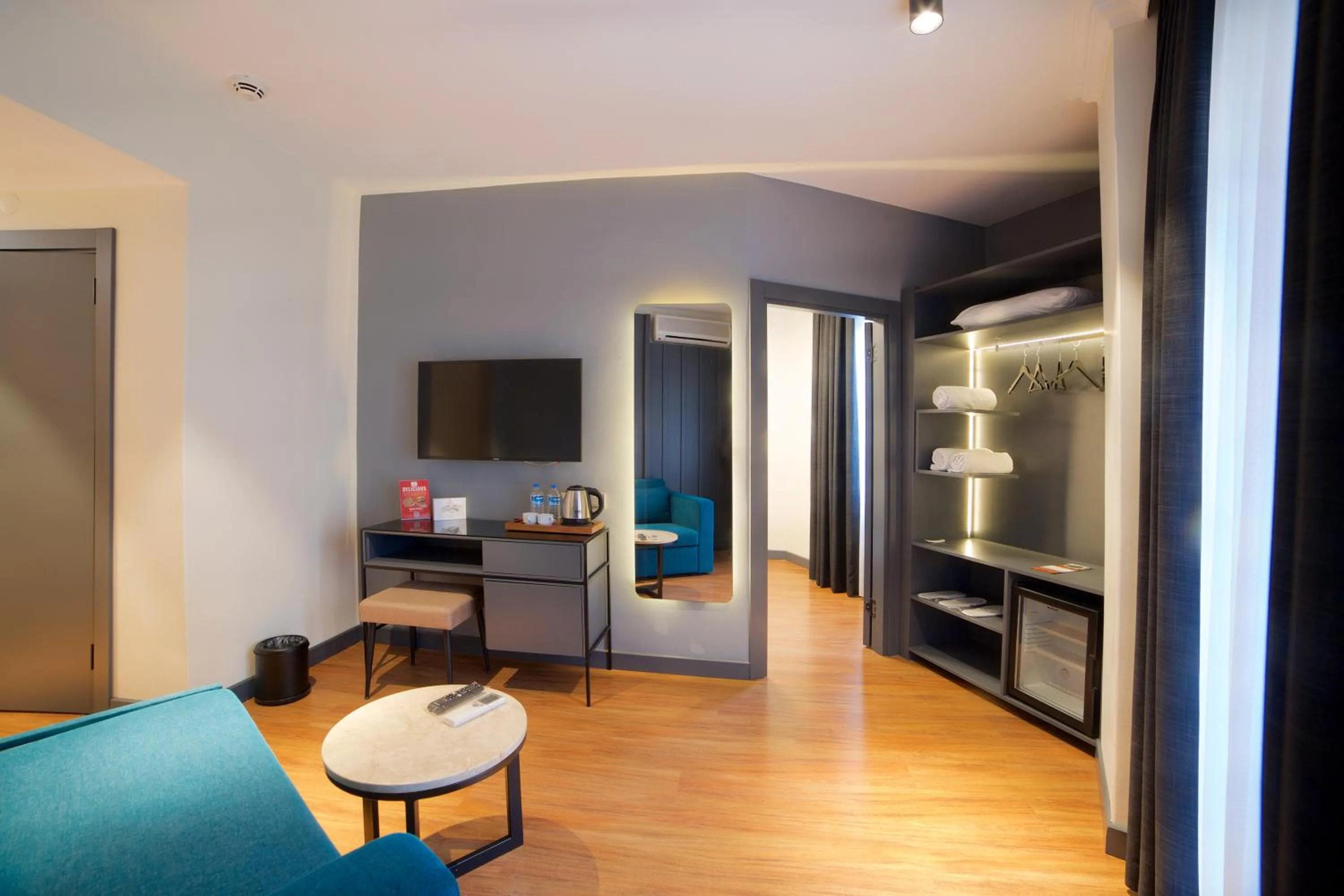 Communal lounge/ TV room in Barin Hotel