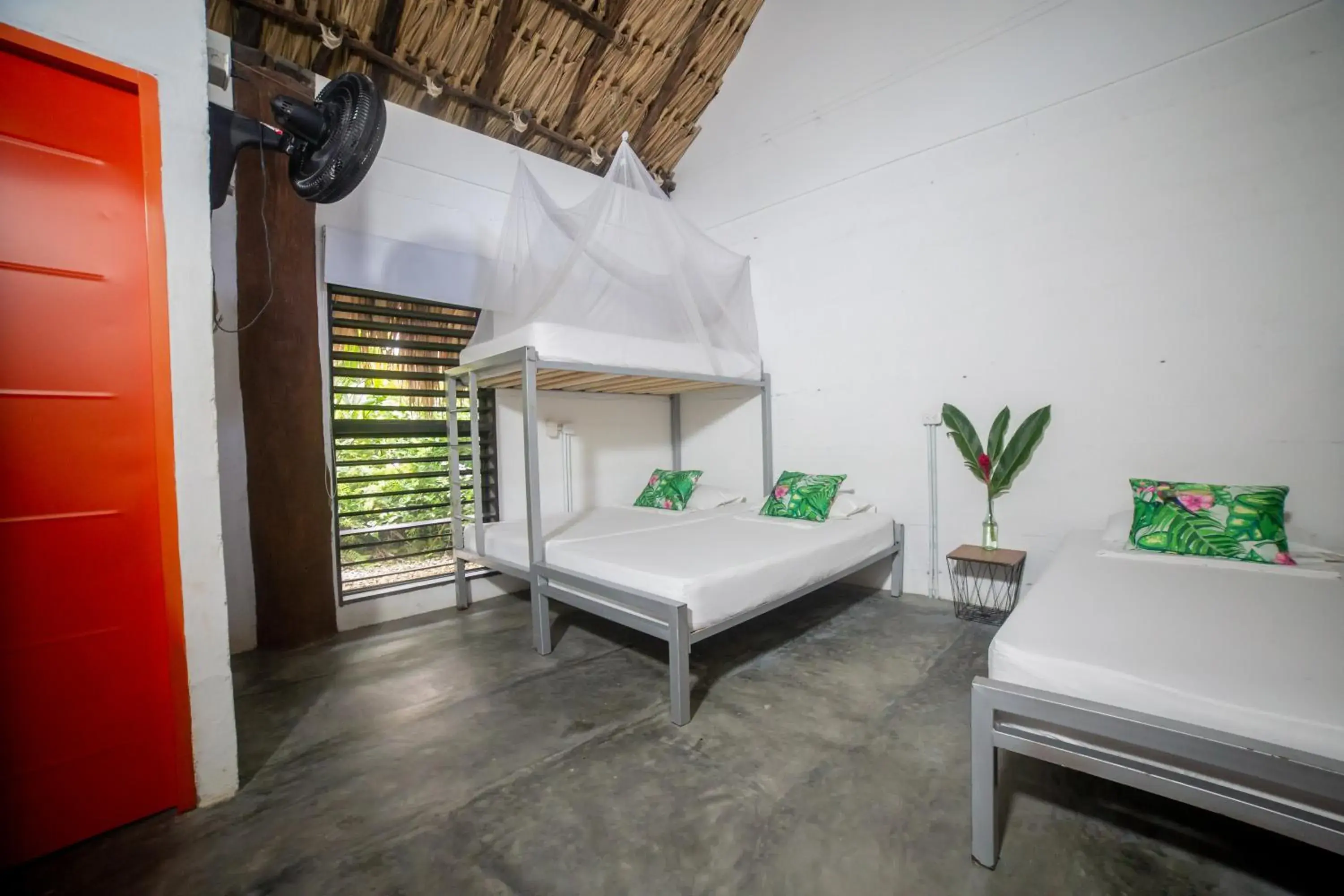 Budget Triple Room in Makenke Hostel By Los Colores Ecoparque Budget Triple Room in Makenke Hostel By Los Colores Ecoparque