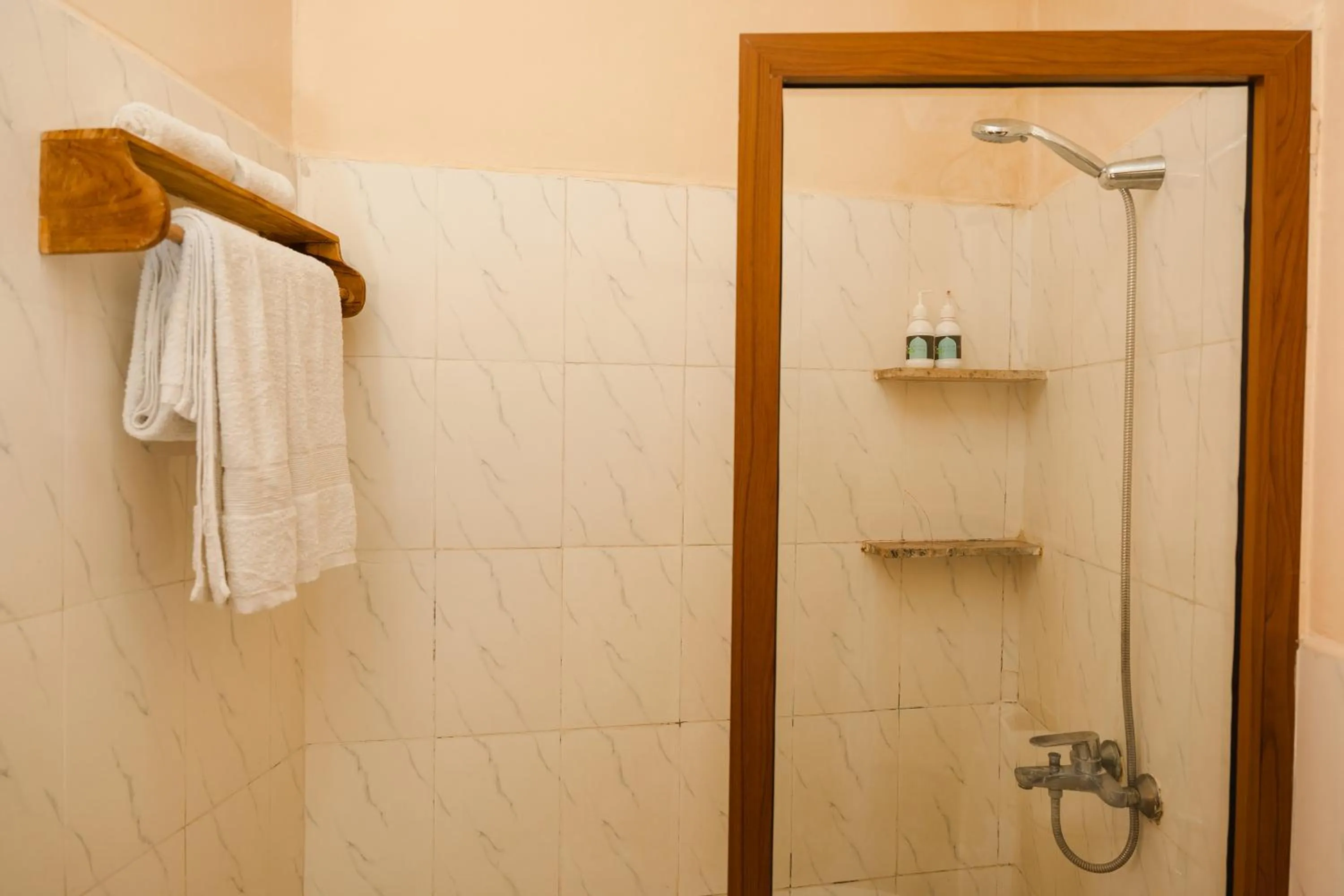 Shower in Emerald Palm Boutique Hotel