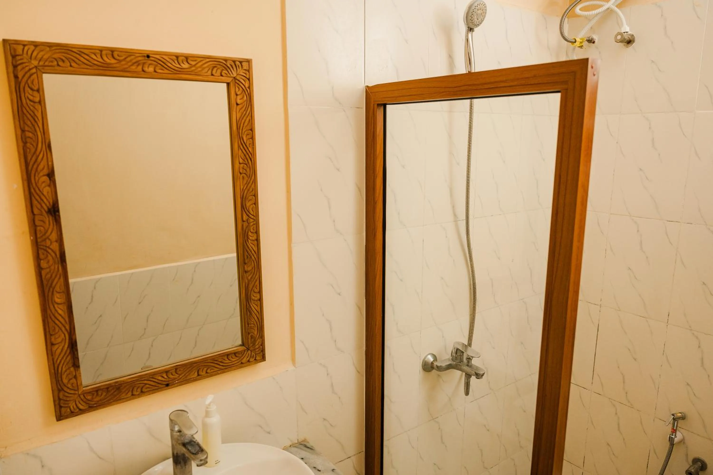 Shower in Emerald Palm Boutique Hotel