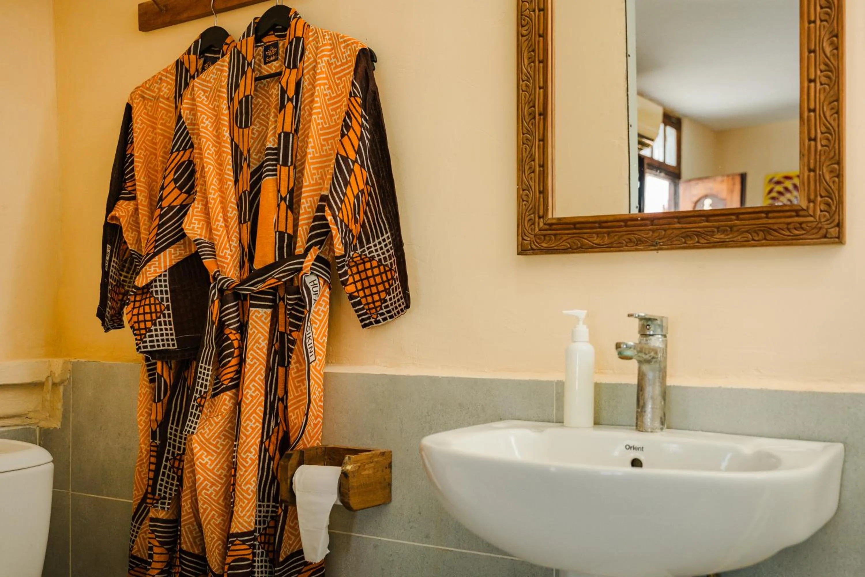 Toilet in Emerald Palm Boutique Hotel