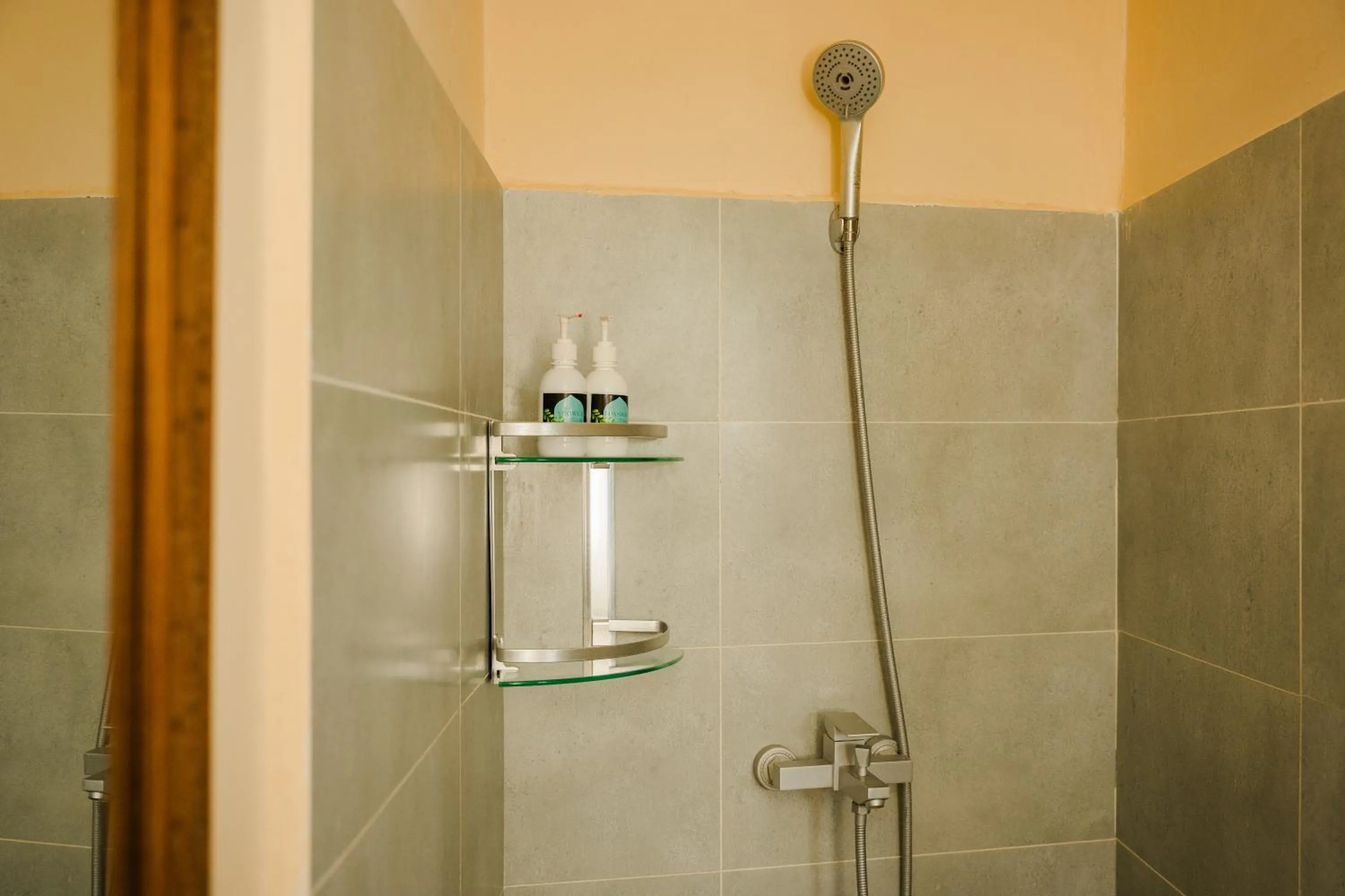 Shower in Emerald Palm Boutique Hotel