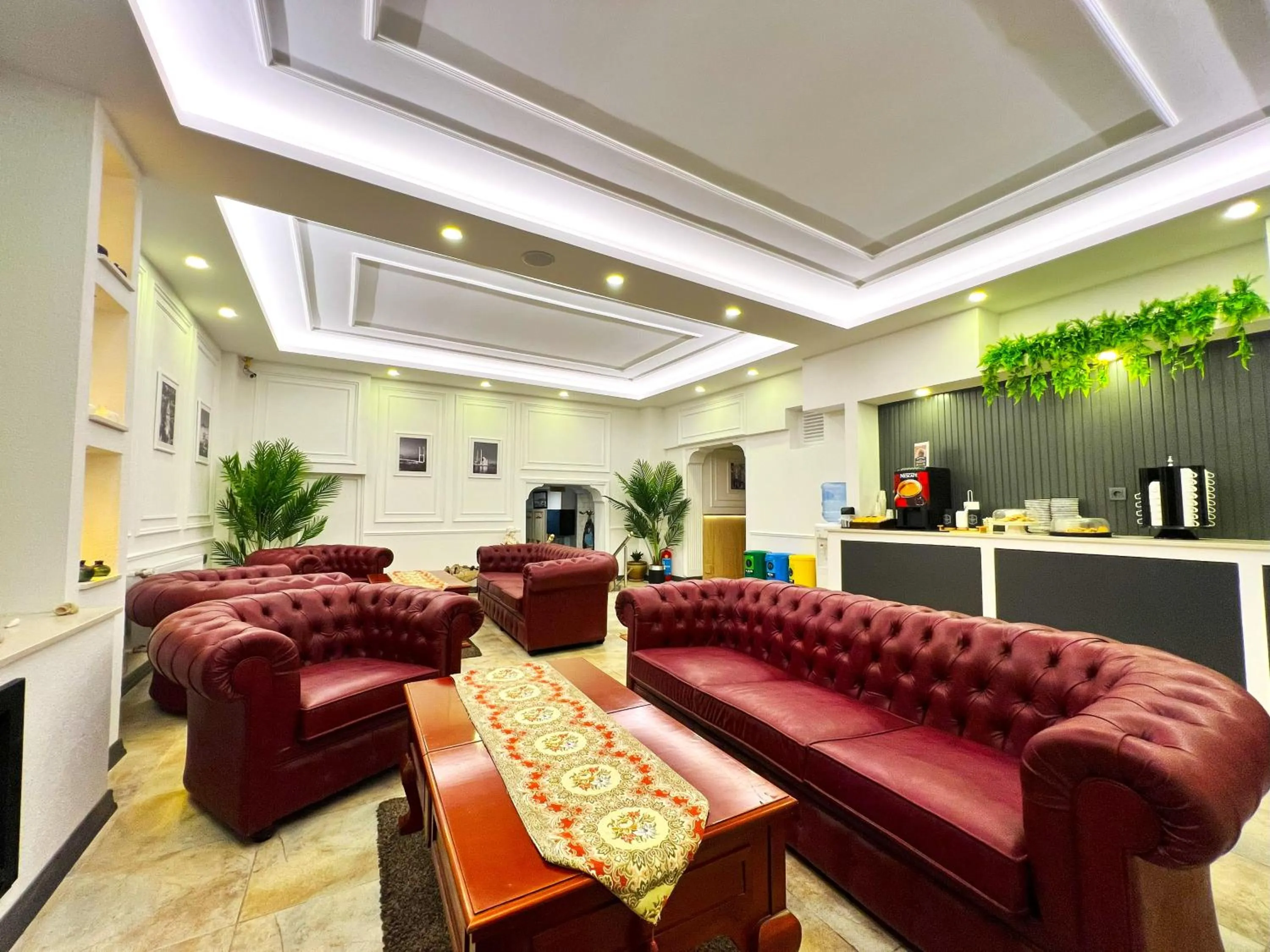 Communal lounge/ TV room in Angel's Home Hotel - Angel Group Hotels