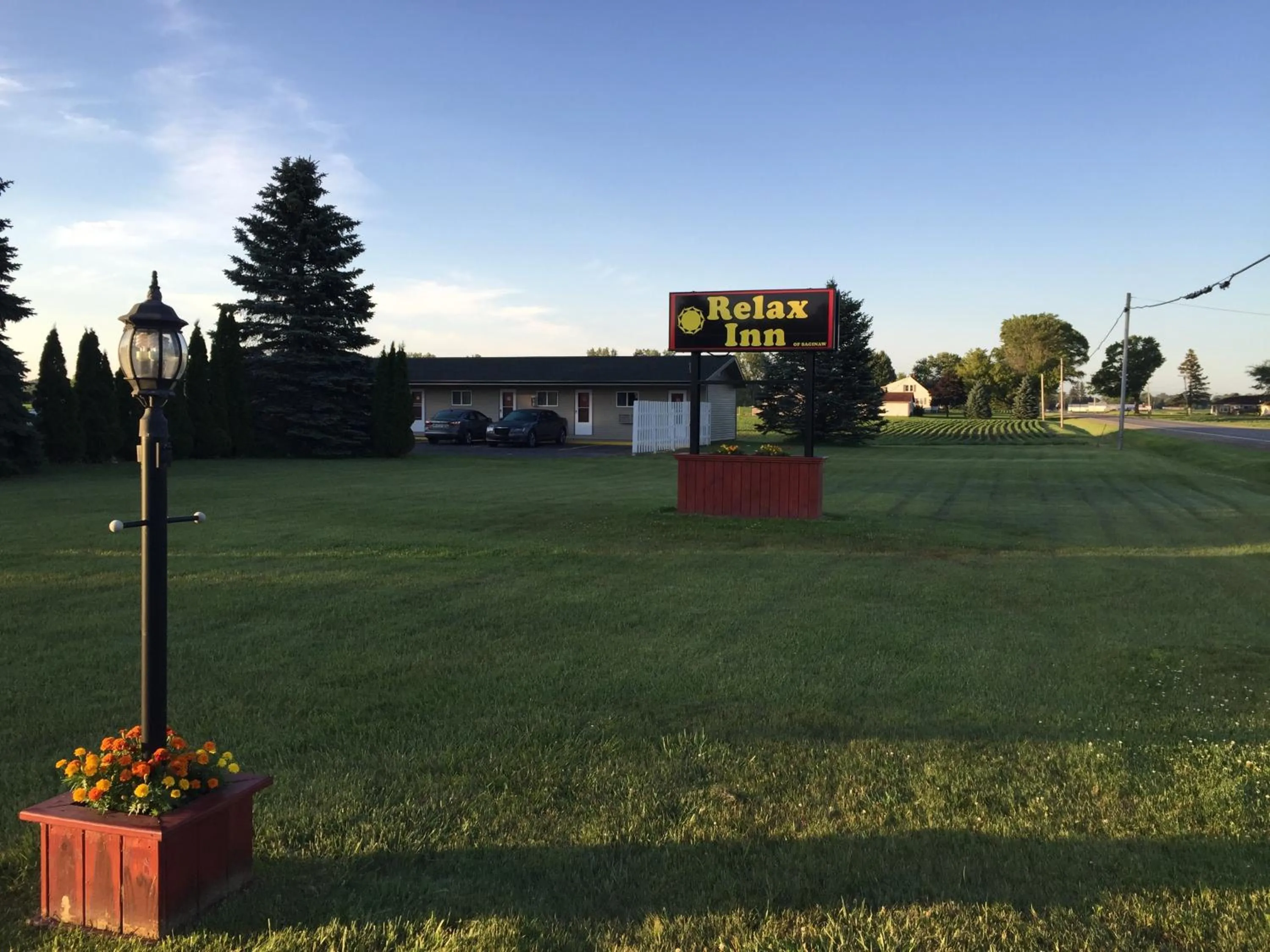 Property logo or sign in Relax Inn - Saginaw