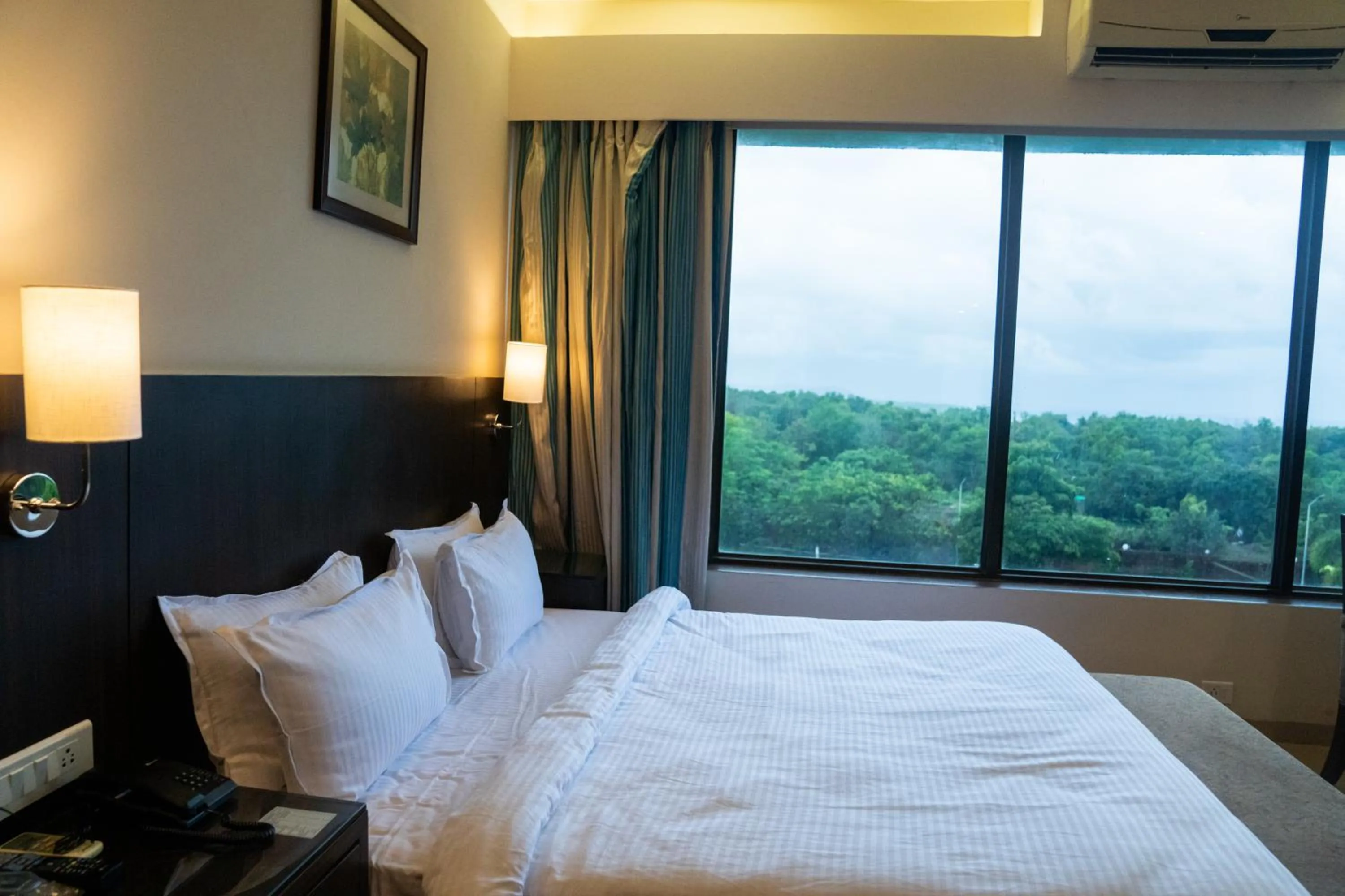 Bed in Greenleaf The Resort & Spa, Ganpatipule