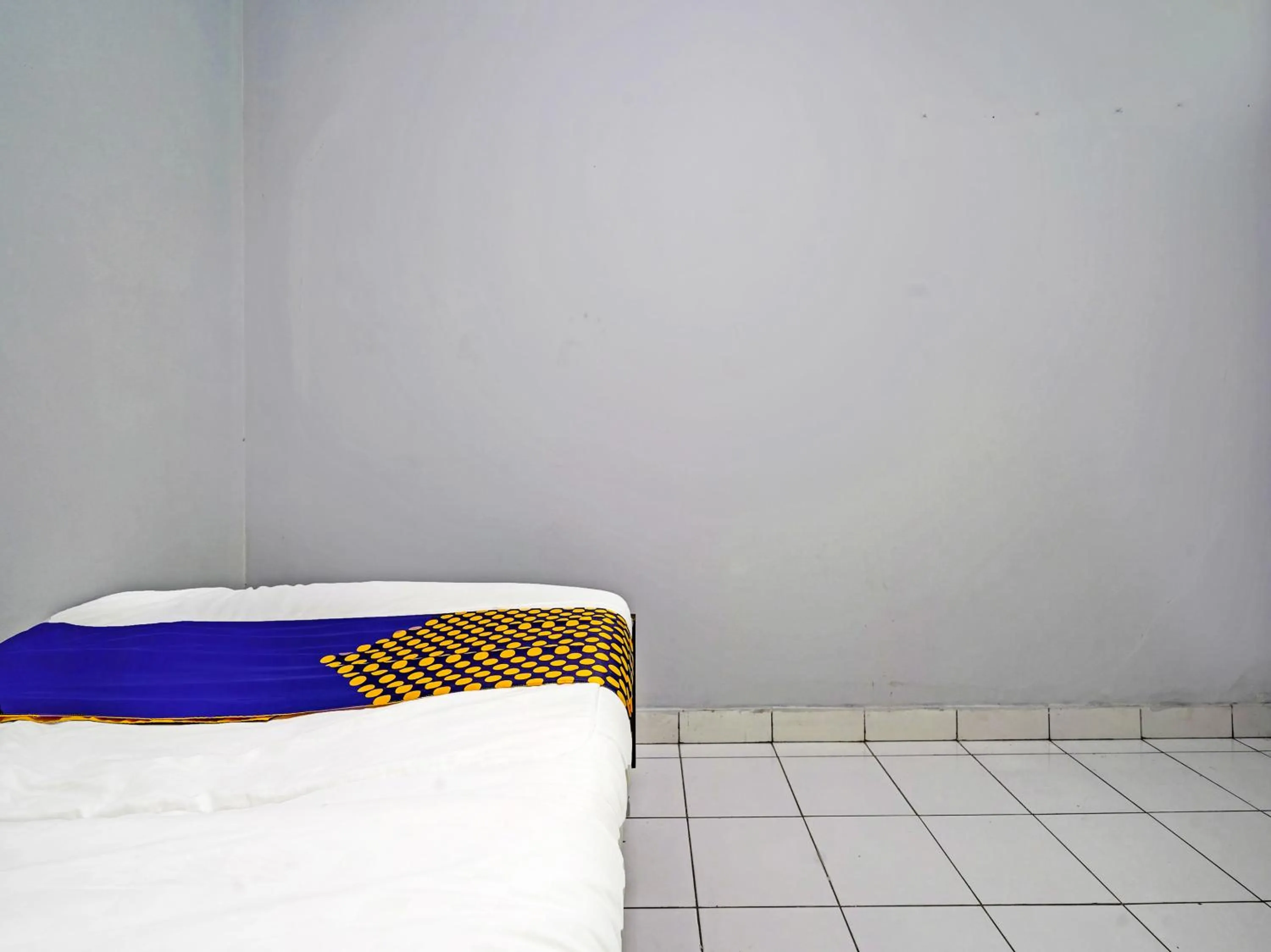 Bedroom in SPOT ON 91325 Pondok Hijau Guest House Syariah