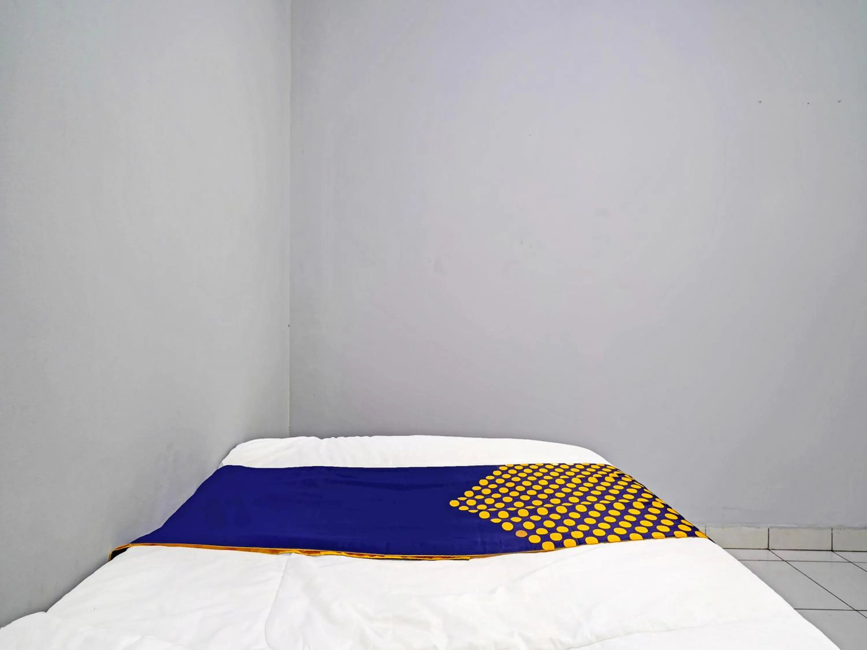 Bedroom in SPOT ON 91325 Pondok Hijau Guest House Syariah