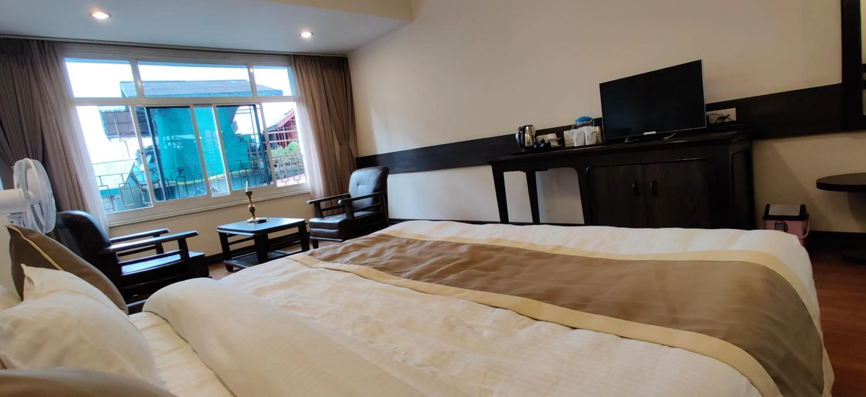 Bed in HOTEL RENDEZVOUS