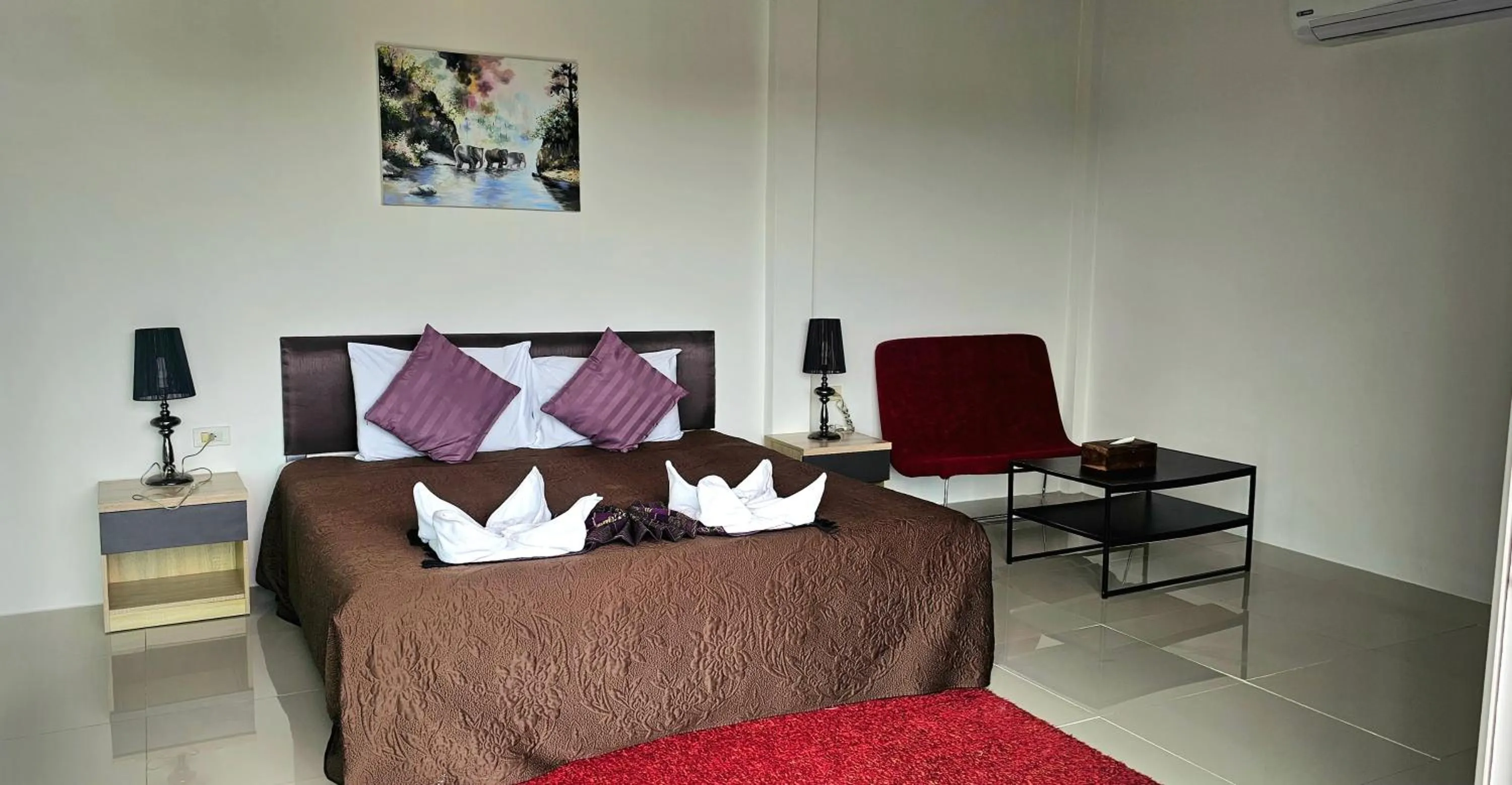 Photo of the whole room, Bed in AM Surin Place