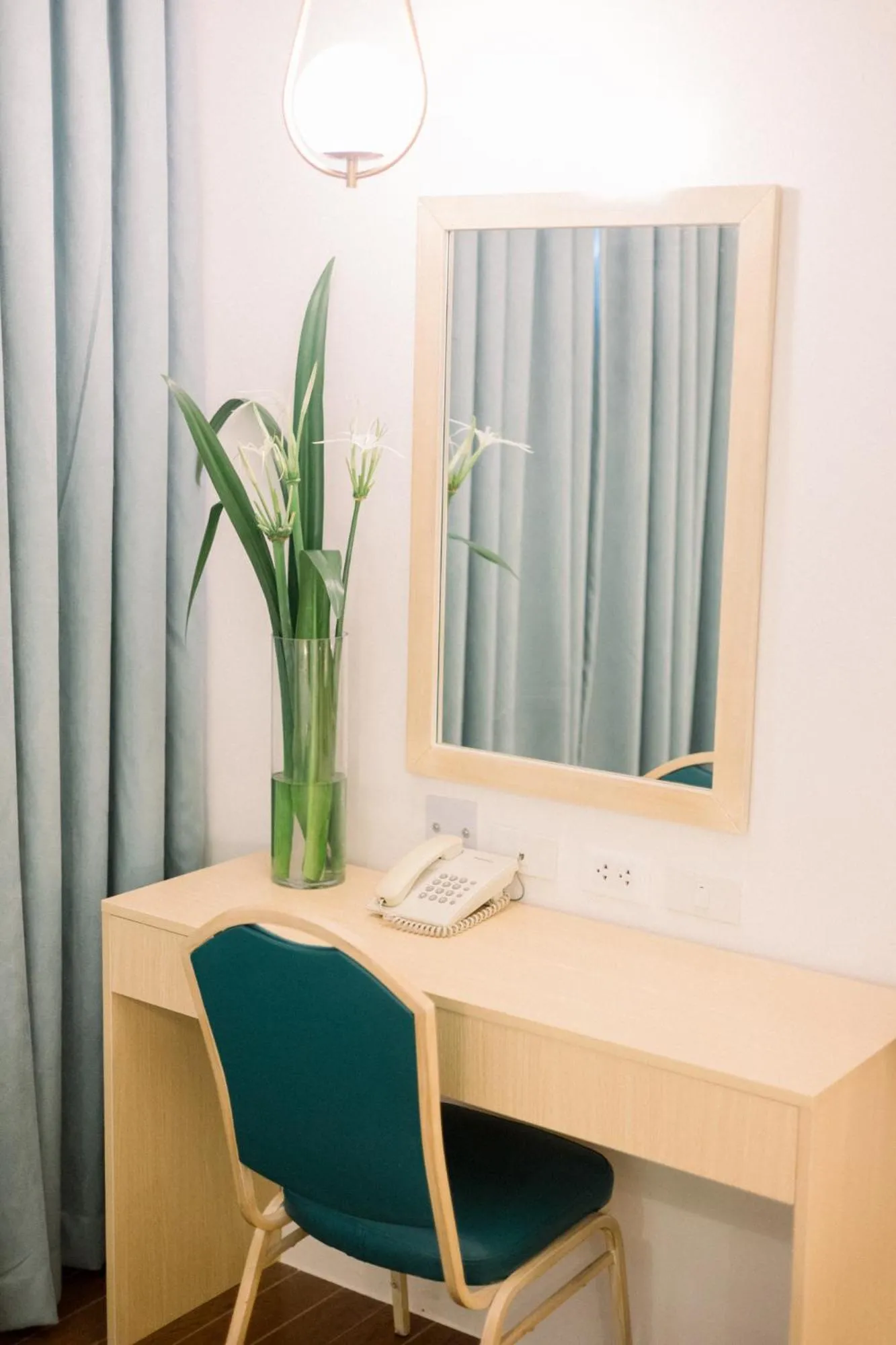 hair dresser in Allure Hotel & Suites