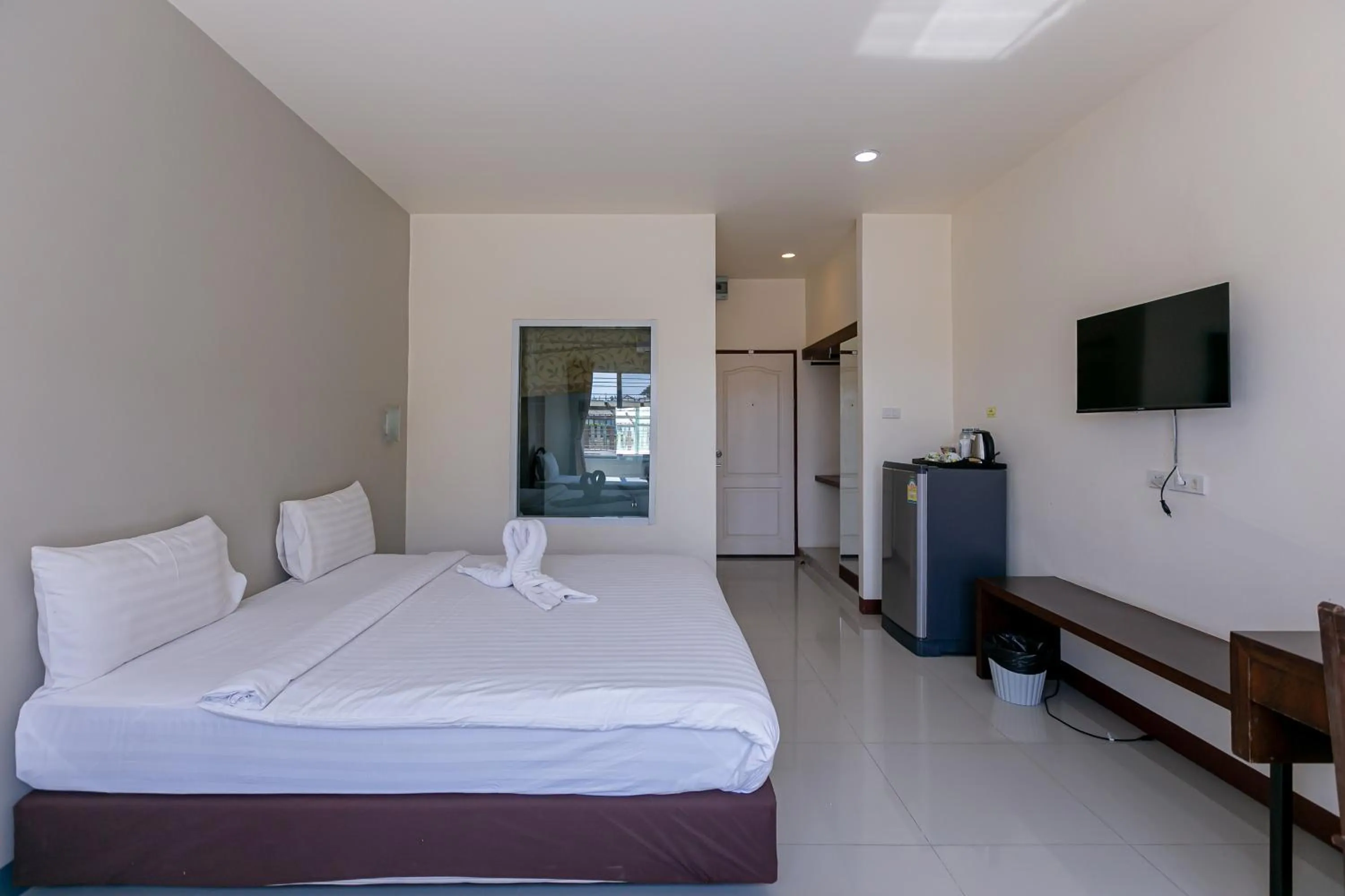 Bed in Panwalee Hotel