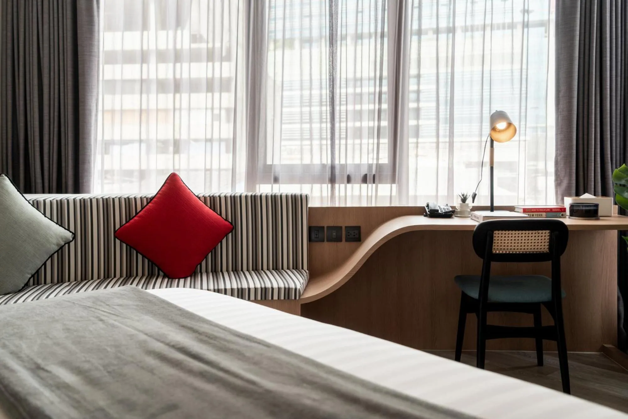 Living room, Bed in Seekers Finders Rama IV Hotel SureStay Collection by BW