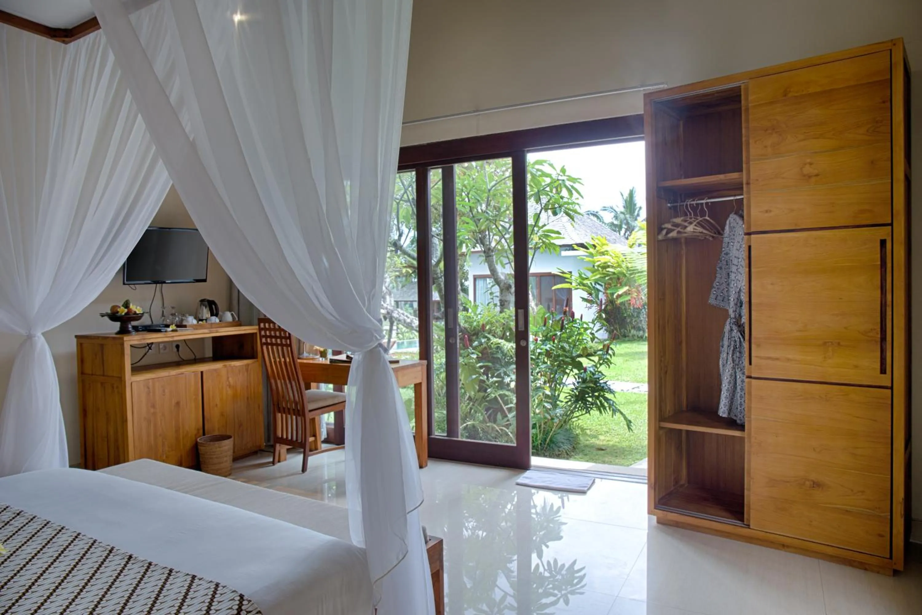 Garden view, Bed in Santun Luxury Private Villas