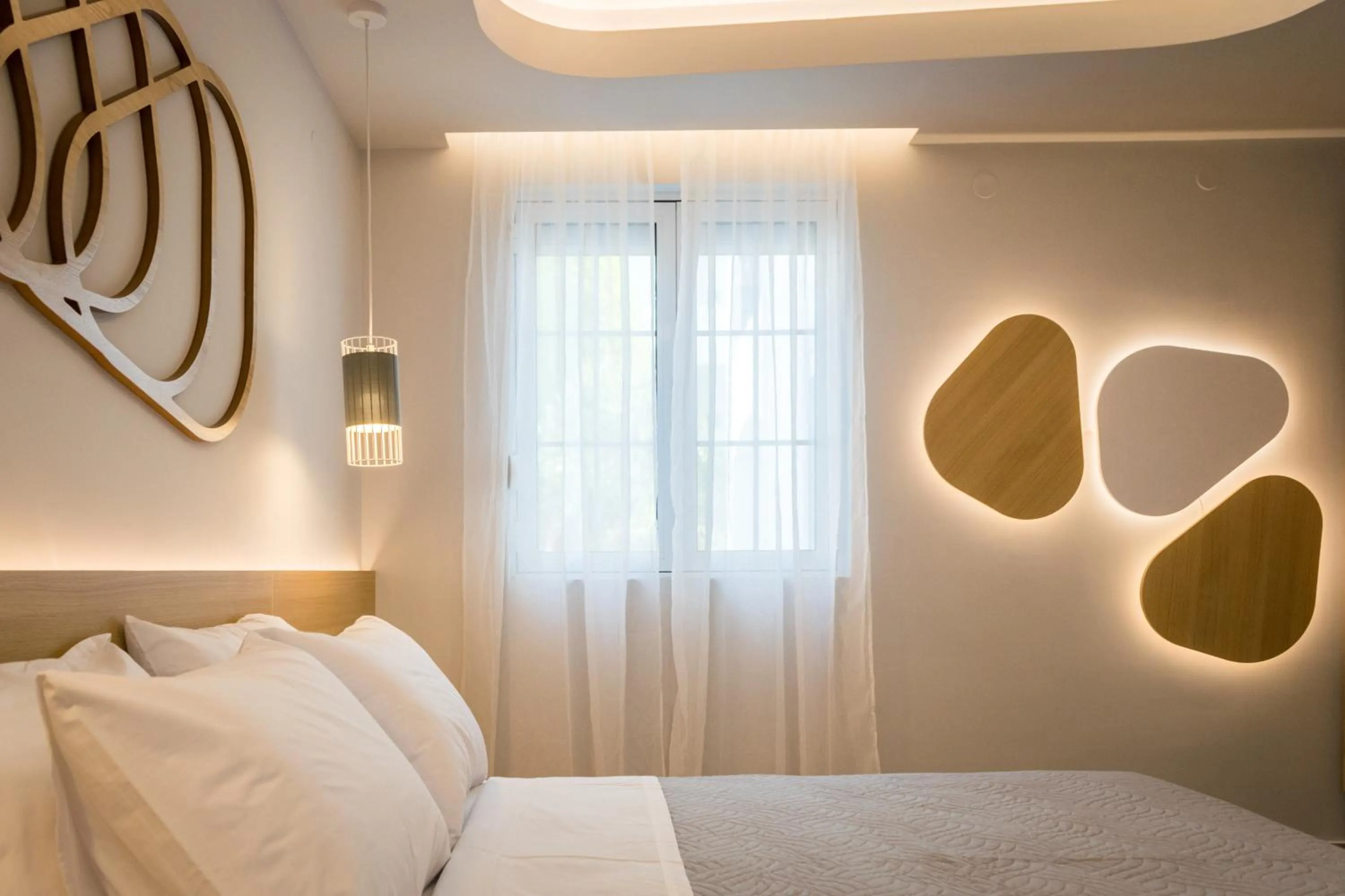 Bed in Evdokia Suites