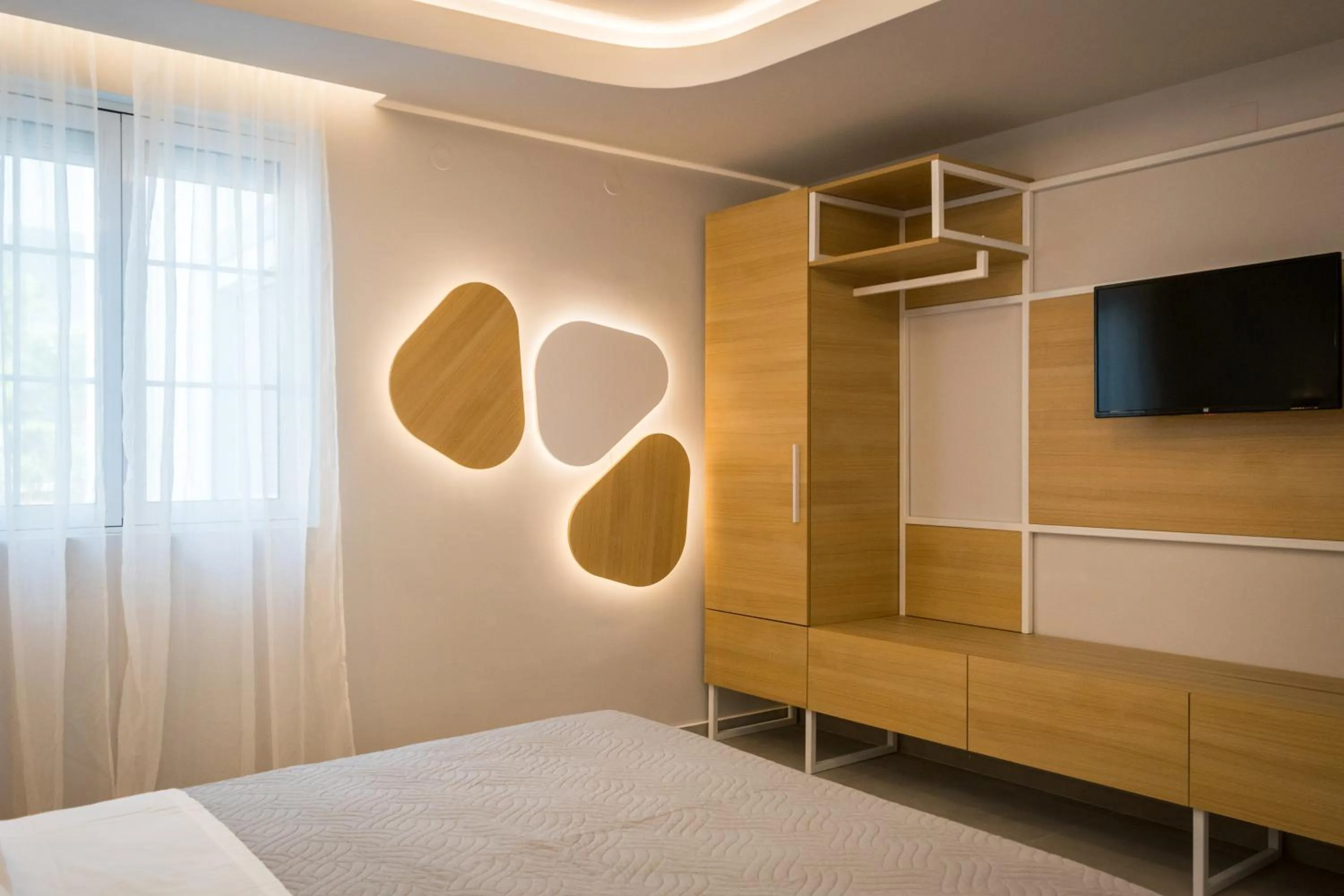 Bed in Evdokia Suites