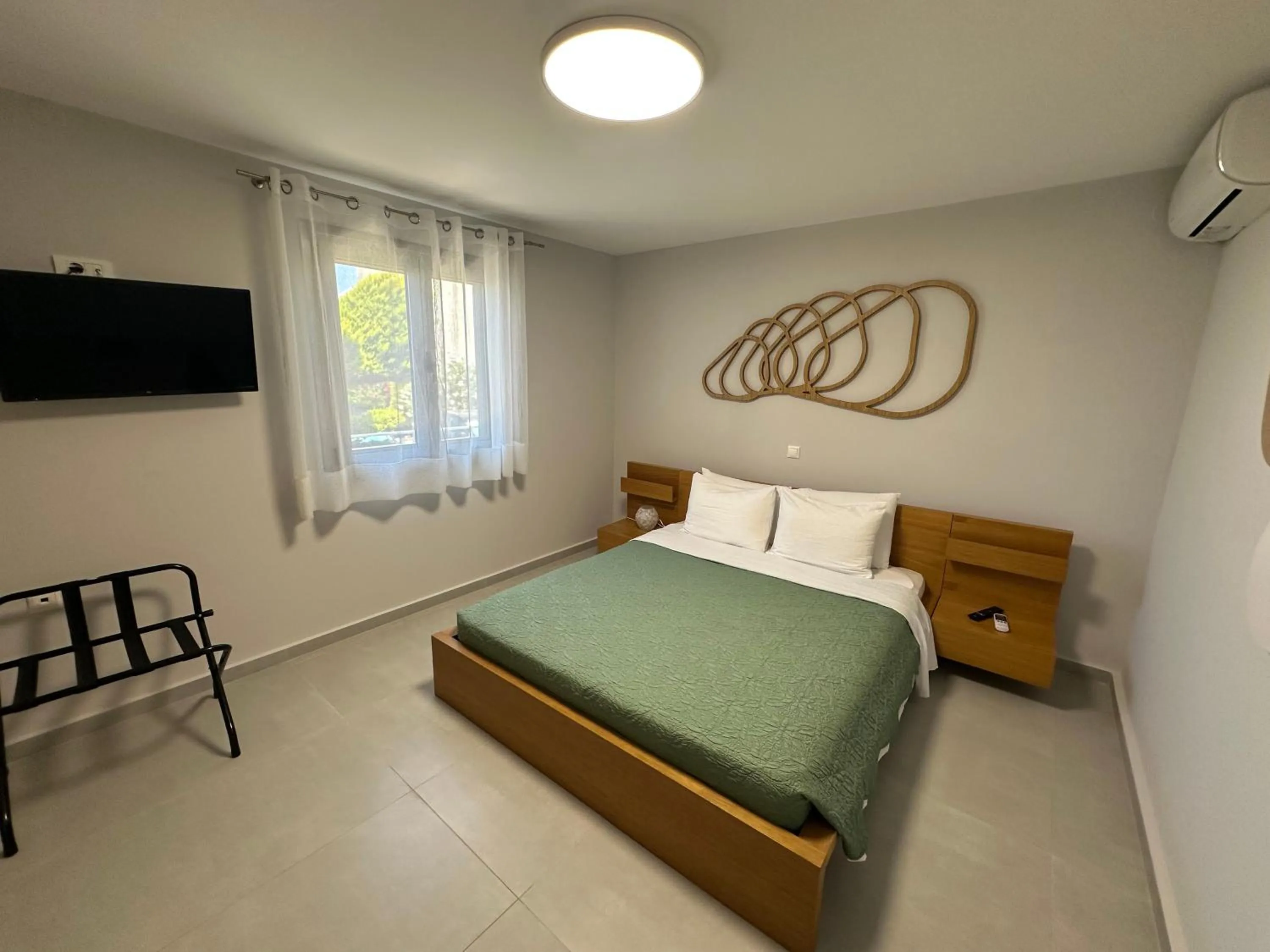 Bed in Evdokia Suites