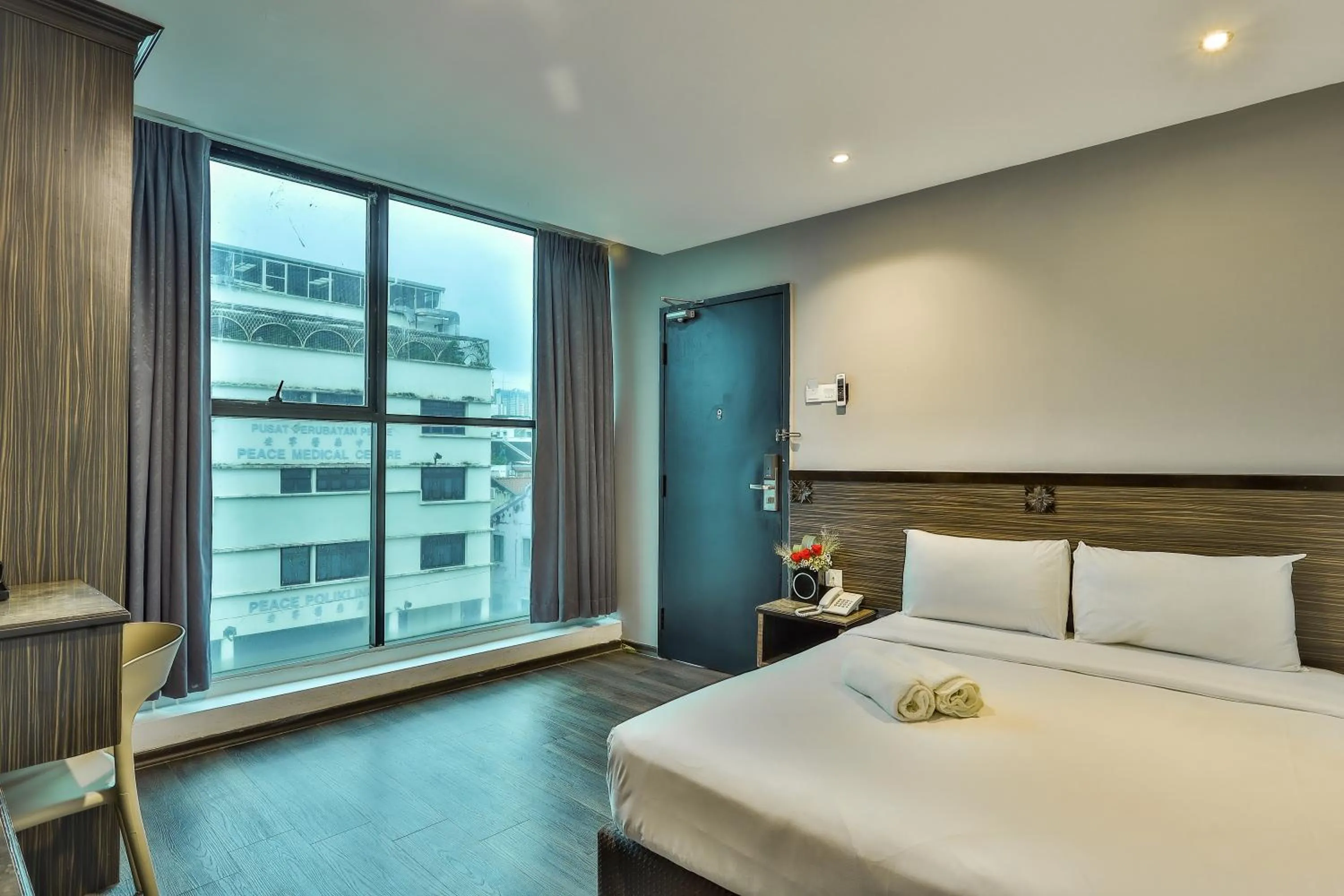 Deluxe Quadruple Room in Q Collection Macalister formerly known as Apple Hotel Penang