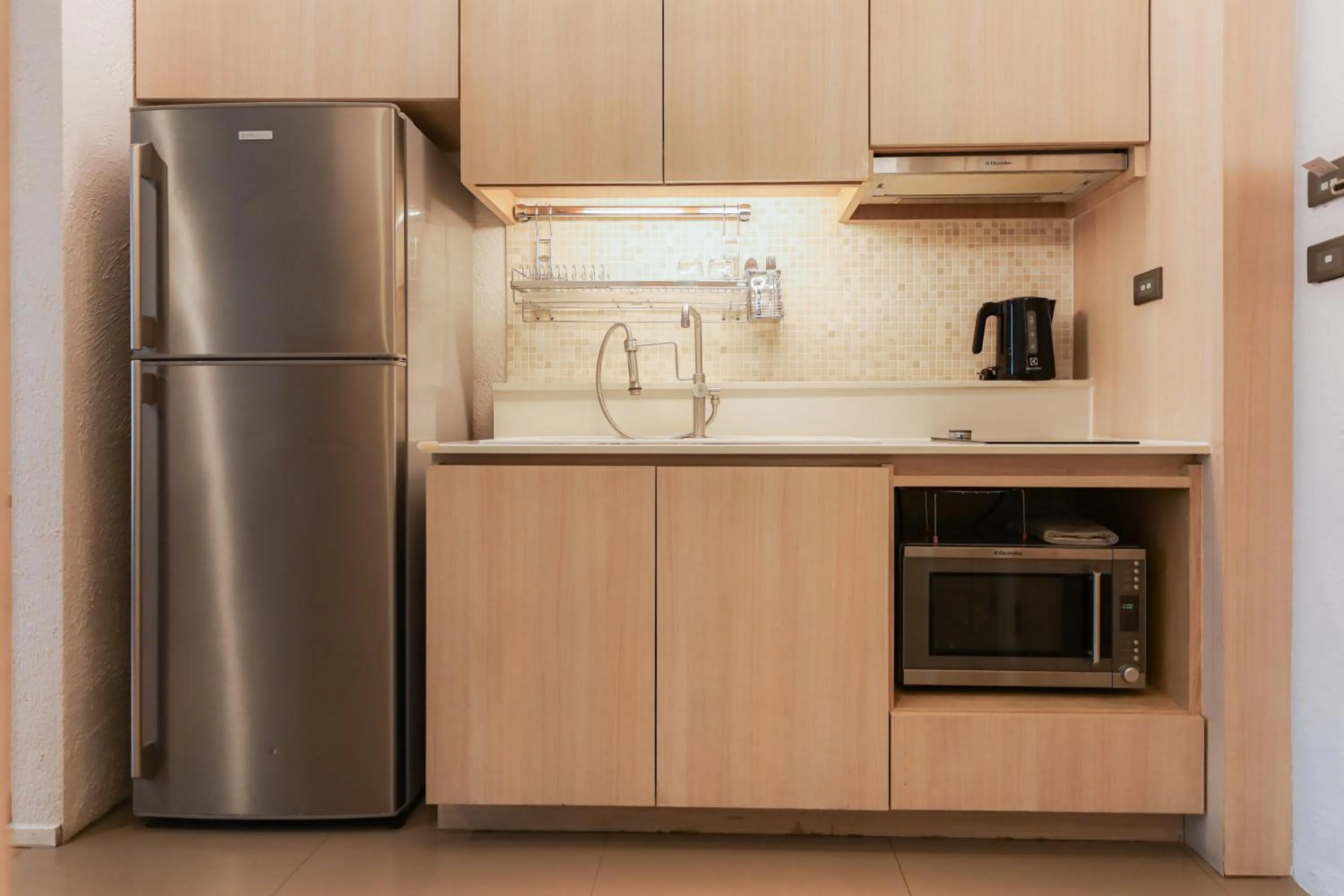 Kitchen or kitchenette in Balcony Seaside Sriracha Hotel & Serviced Apartments