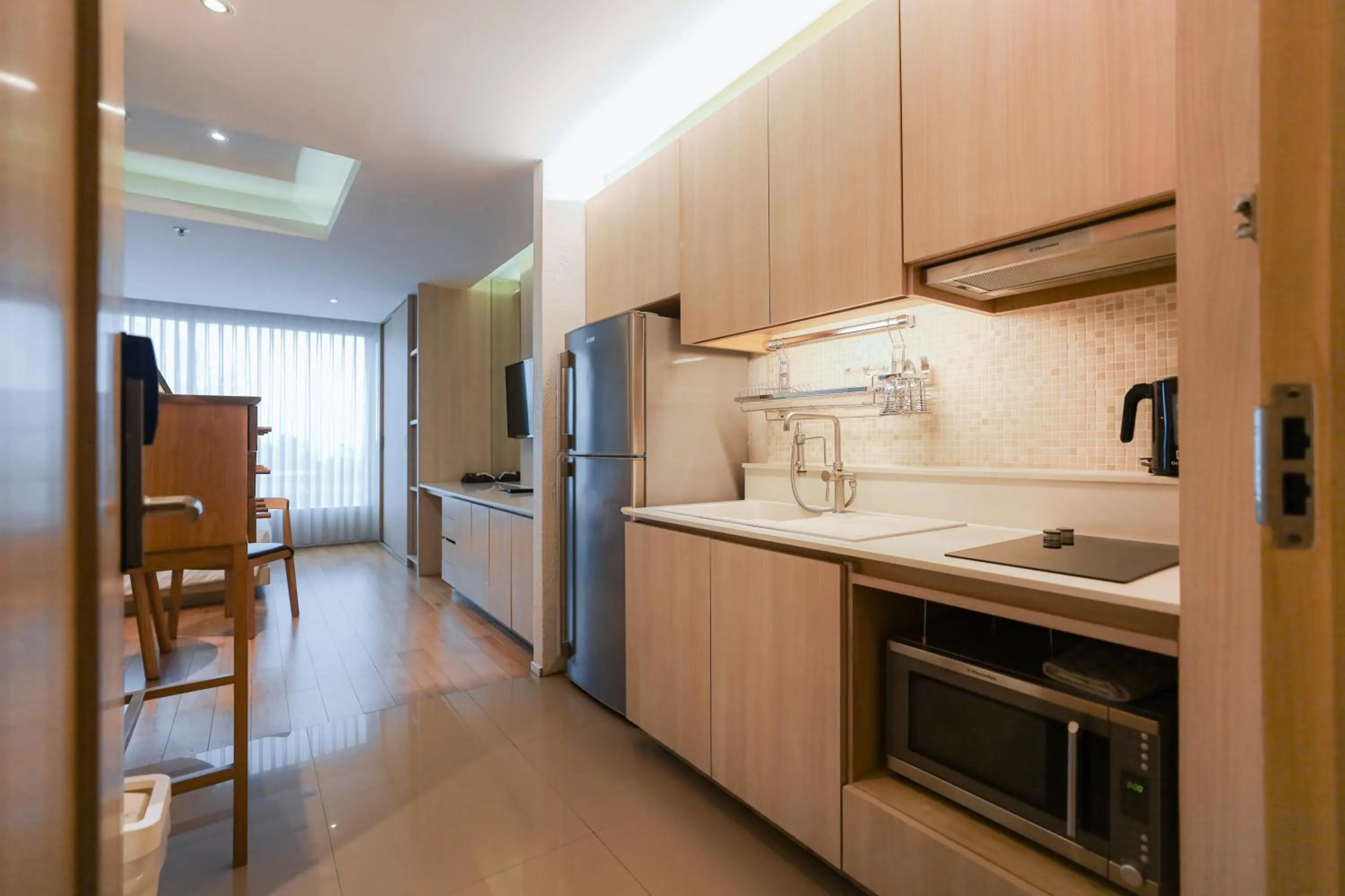 Kitchen or kitchenette in Balcony Seaside Sriracha Hotel & Serviced Apartments