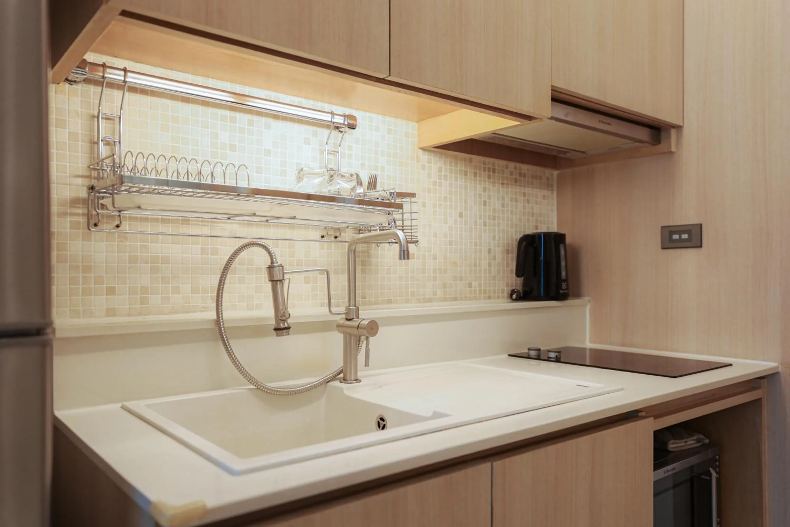 Kitchen or kitchenette in Balcony Seaside Sriracha Hotel & Serviced Apartments