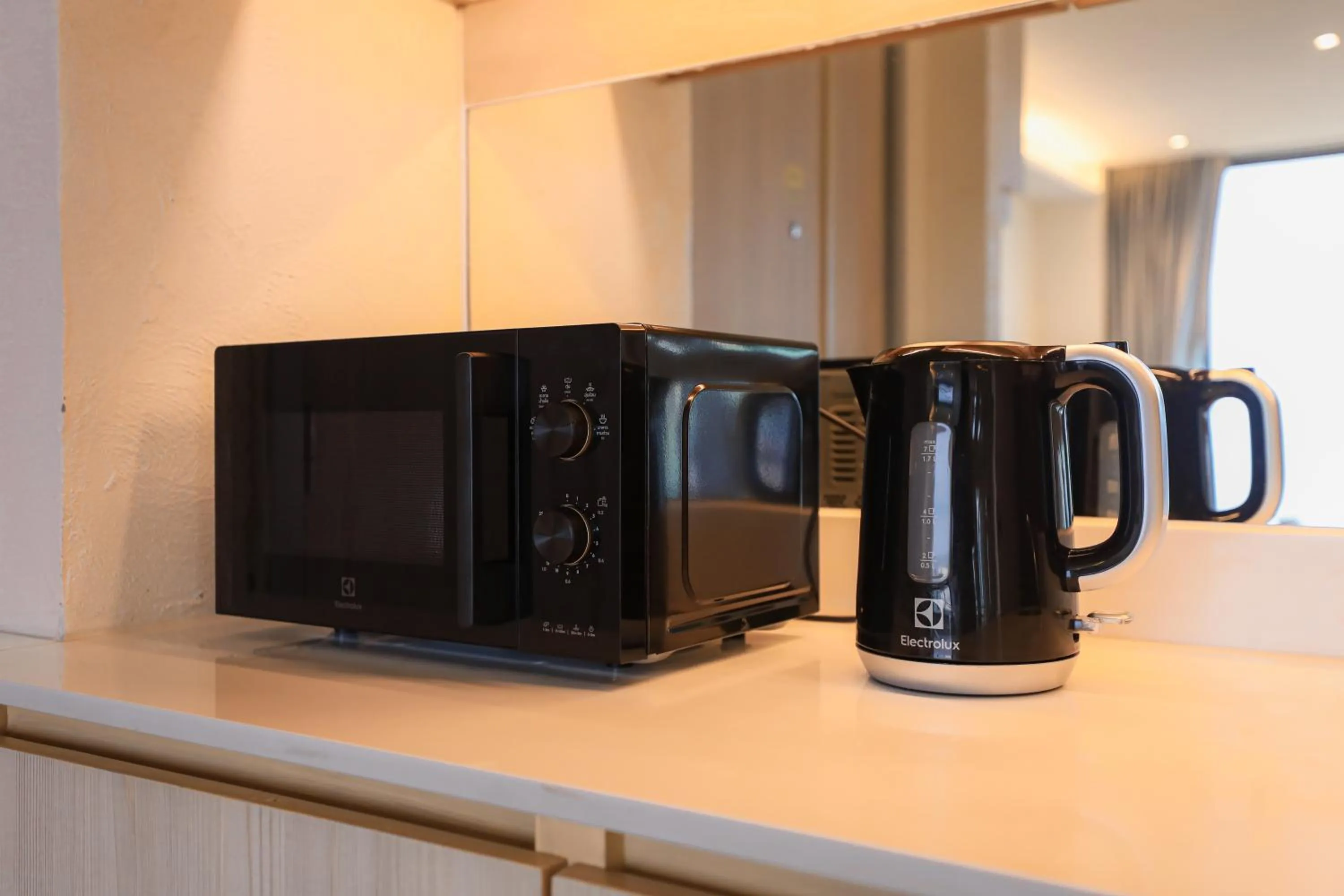 Kitchen or kitchenette in Balcony Seaside Sriracha Hotel & Serviced Apartments