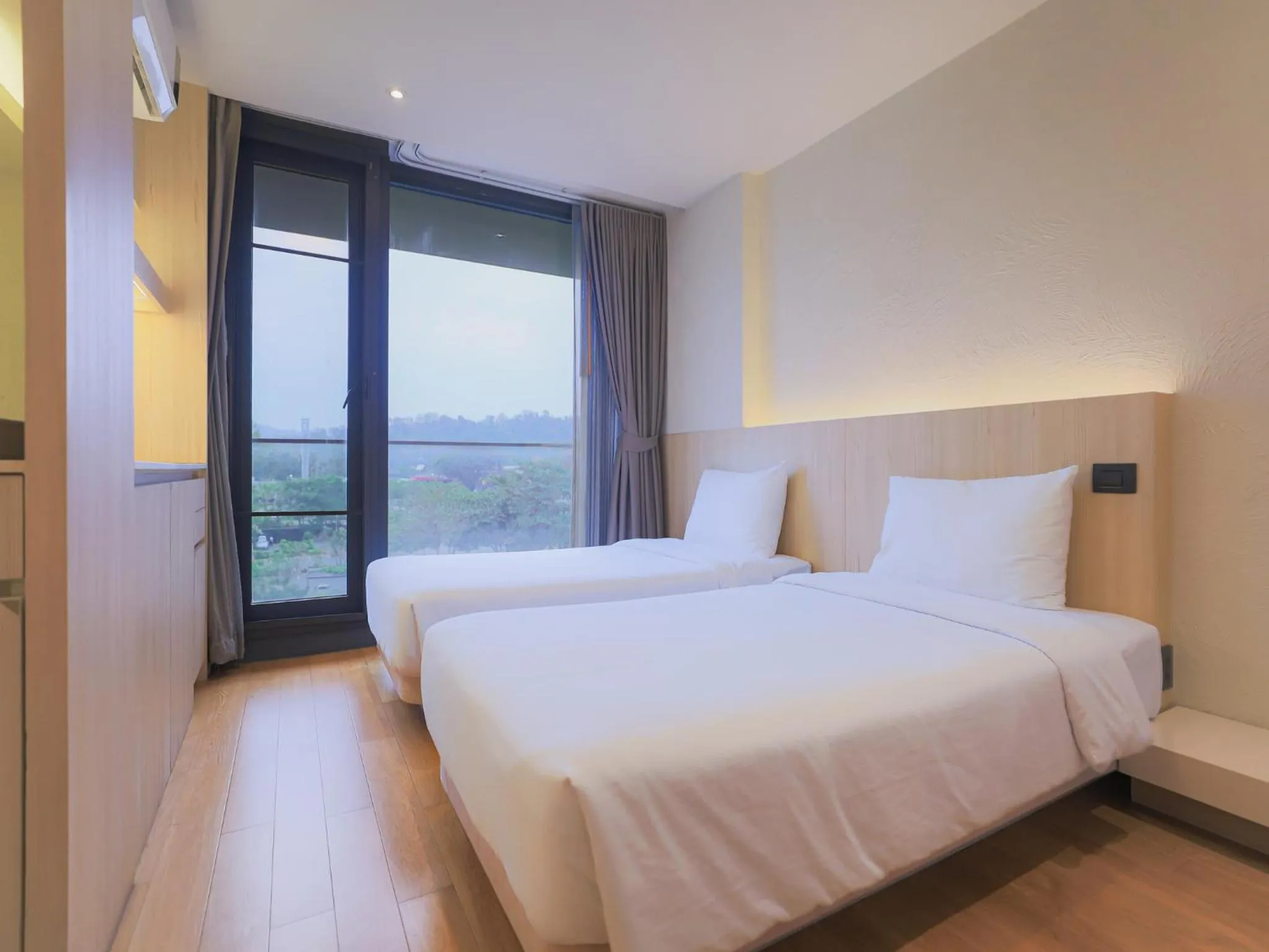 Bed in Balcony Seaside Sriracha Hotel & Serviced Apartments