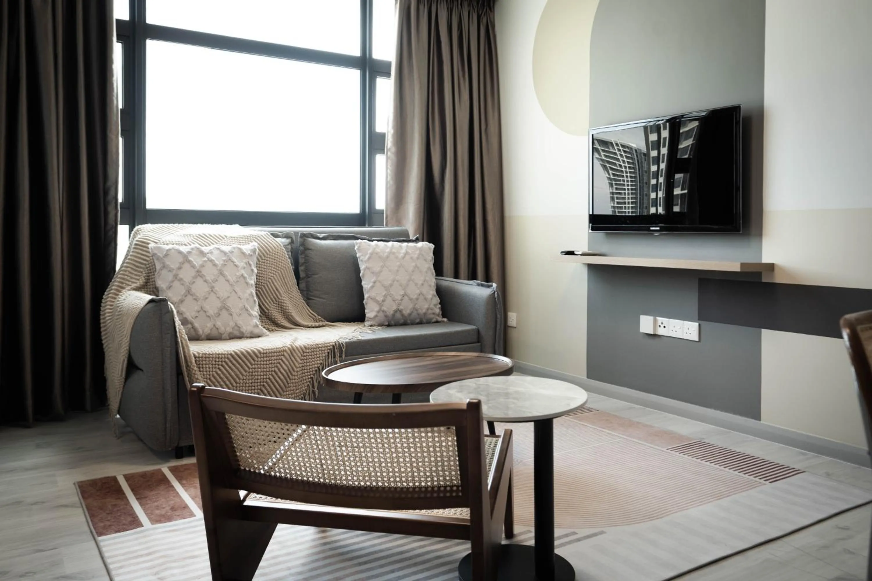 Living room in Jesselton Quay by Pinstay