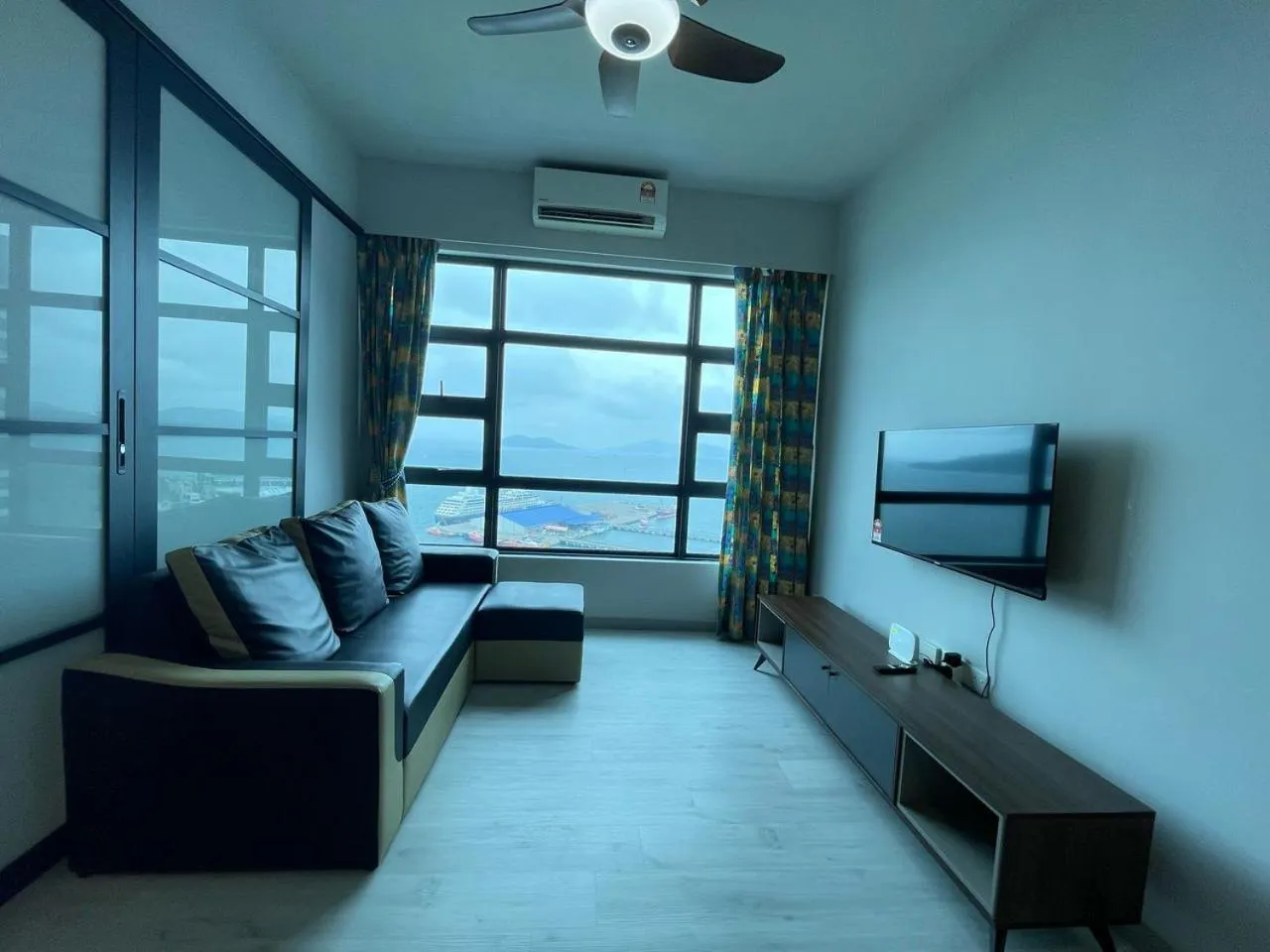 Living room in Jesselton Quay by Pinstay