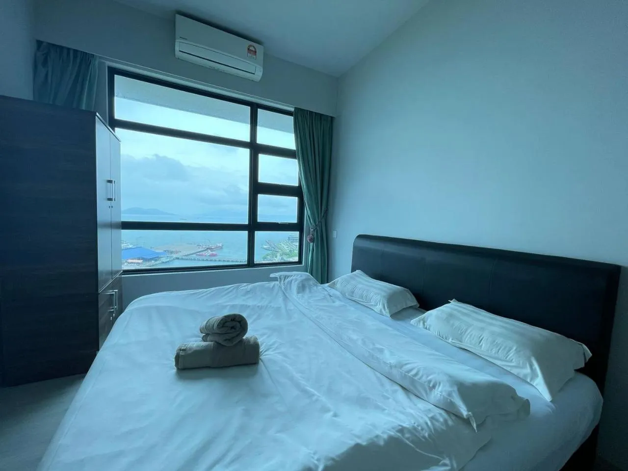 Bed in Jesselton Quay by Pinstay