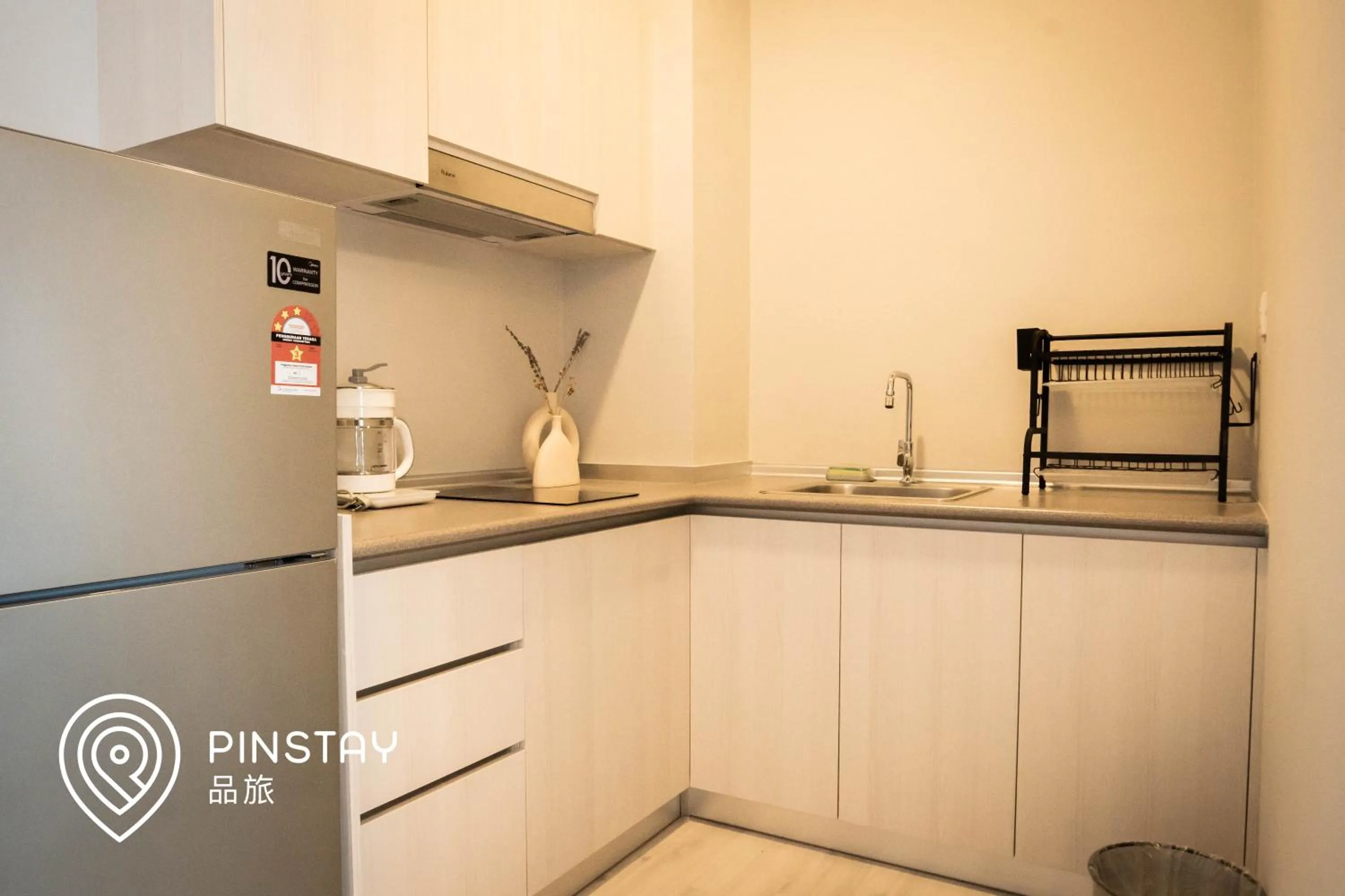Kitchen or kitchenette in Jesselton Quay by Pinstay