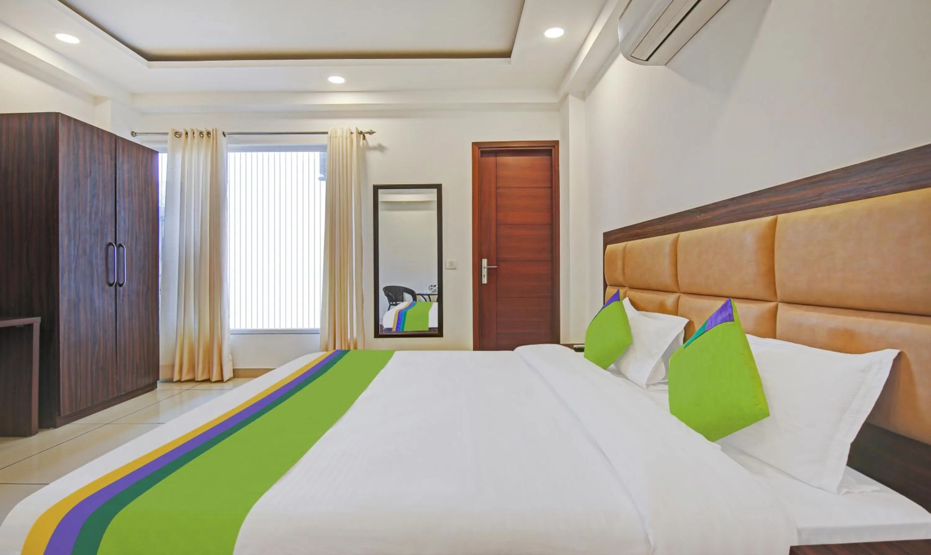 Bedroom, Bed in Treebo Aviraj Inn