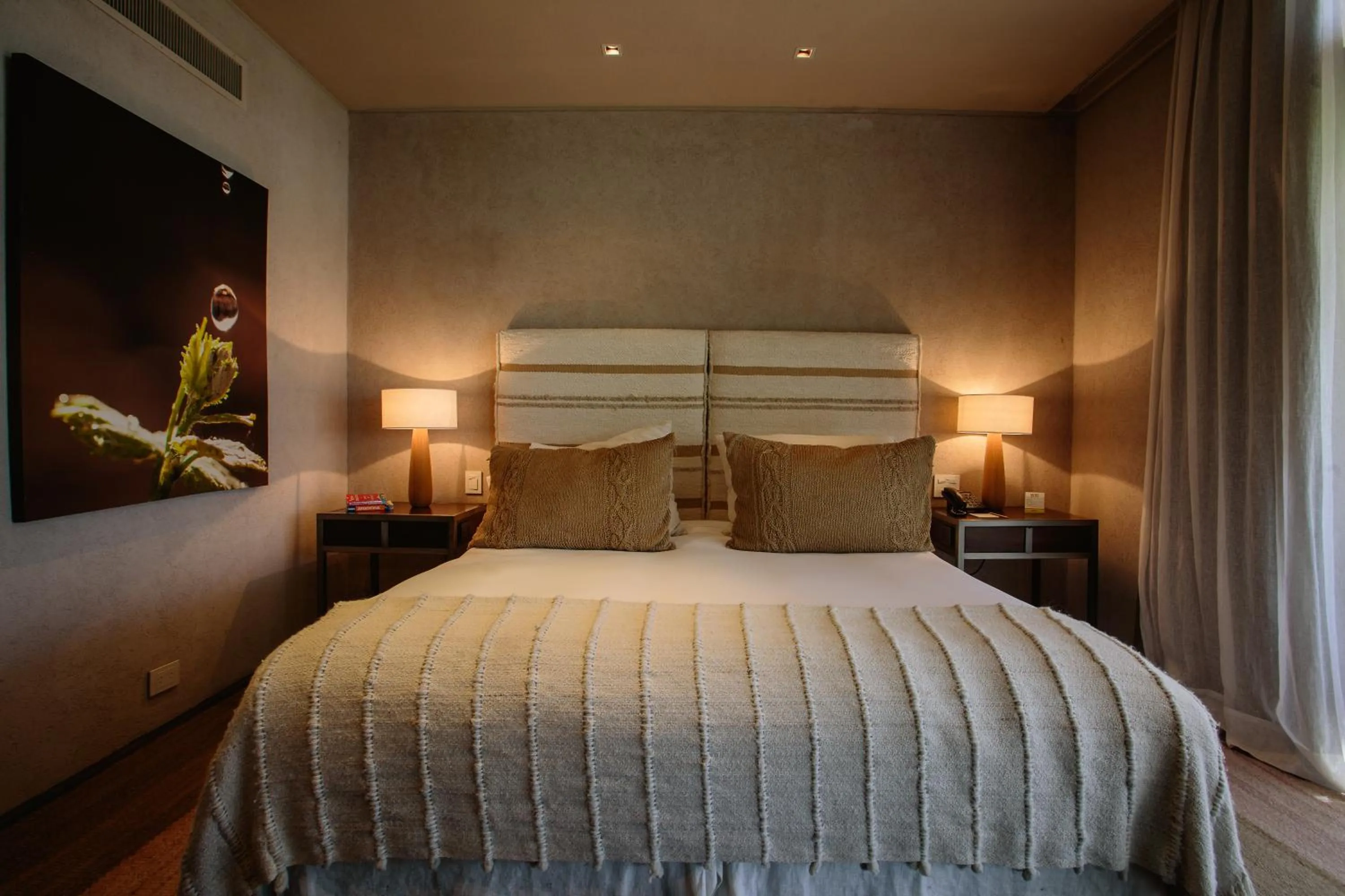 Bed in The Vines Resort & Spa