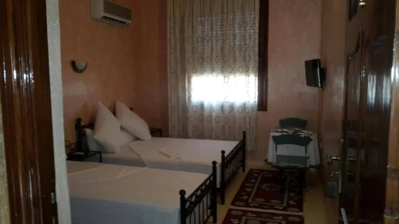 Bed in Hotel Espace Tifawine