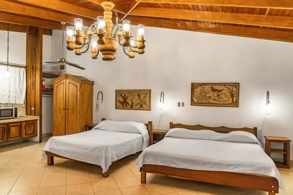 Bed in Costa Verde Inn