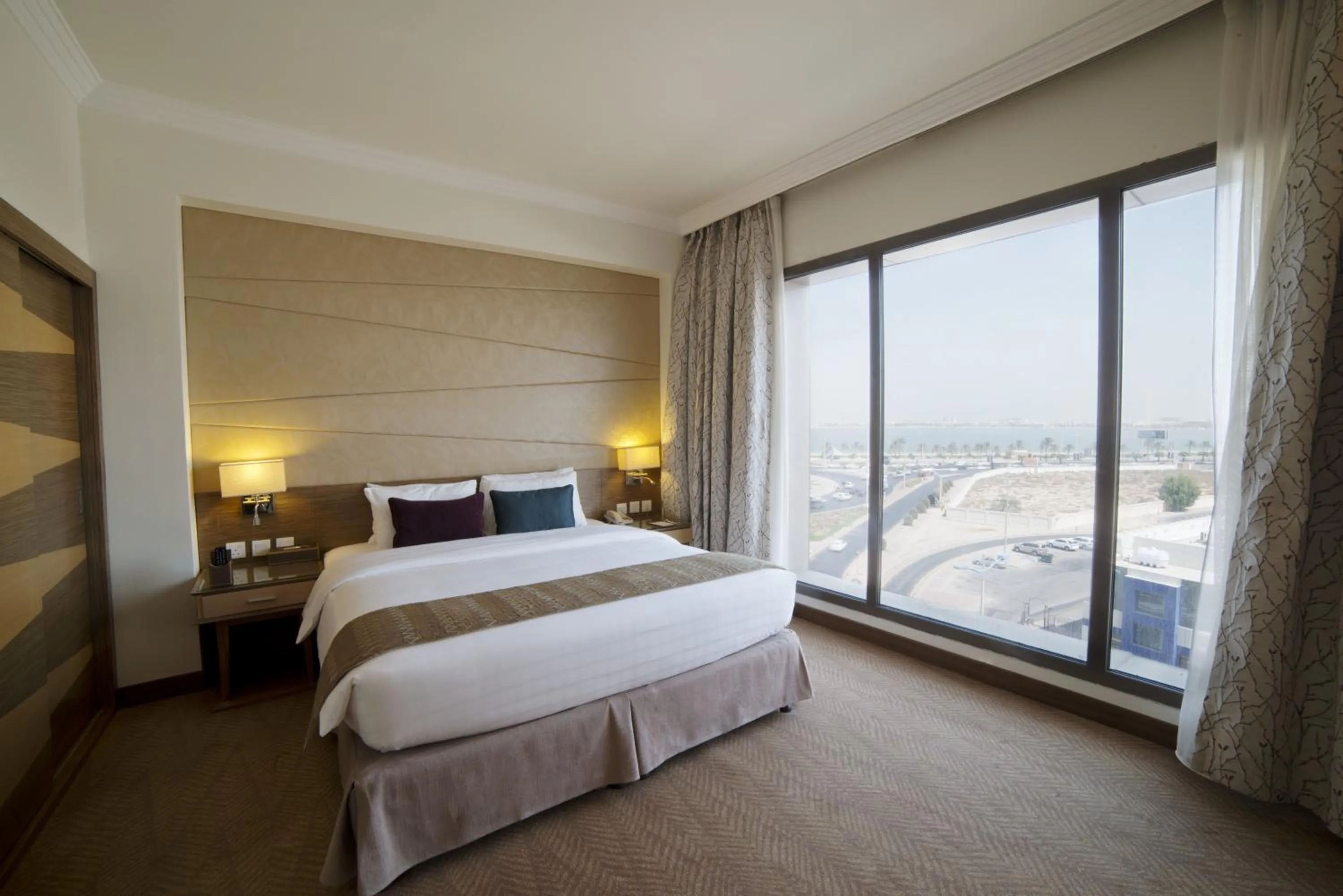 View (from property/room), Bed in Golden Tulip Dammam Corniche Hotel
