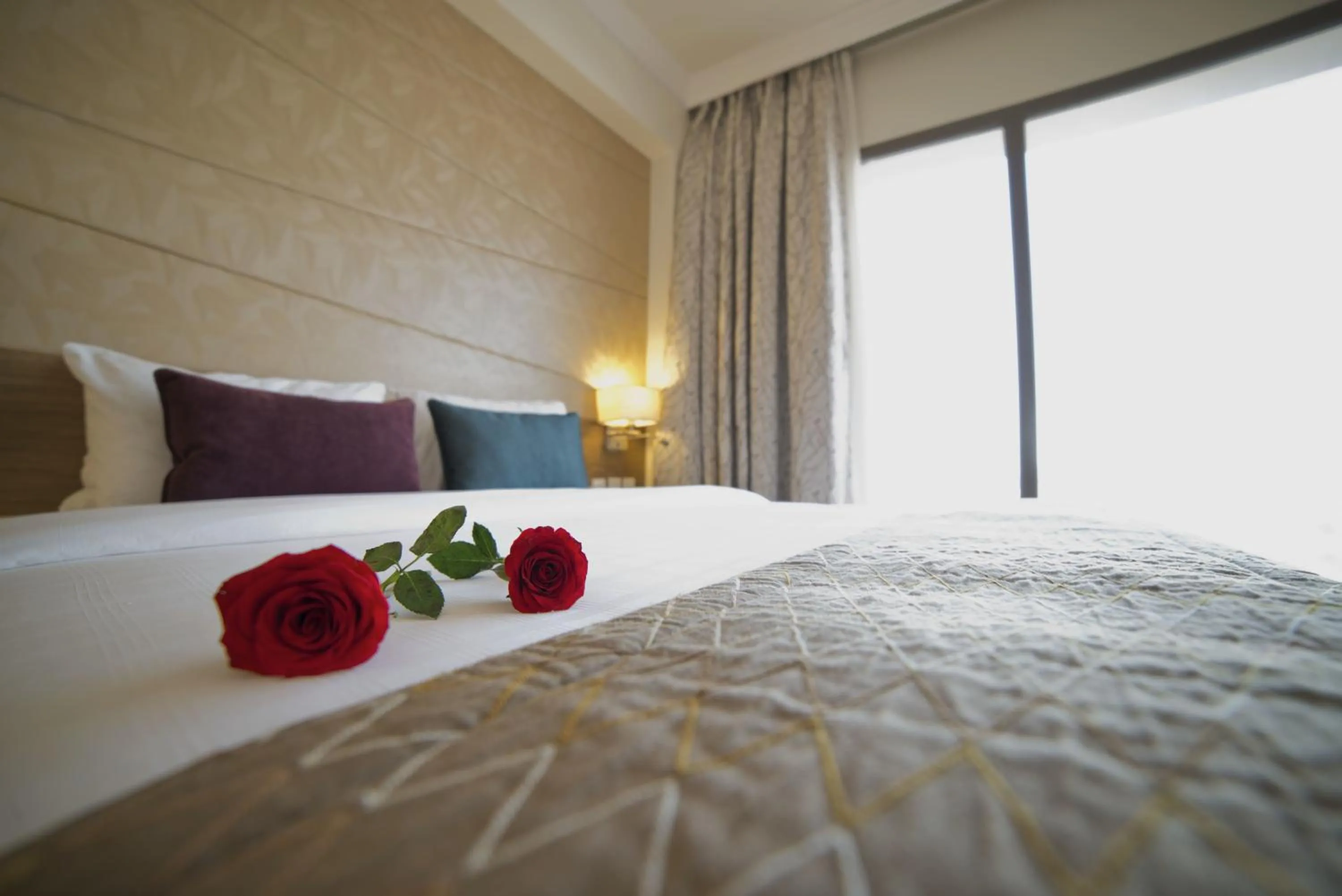 Bed in Golden Tulip Dammam Corniche Hotel