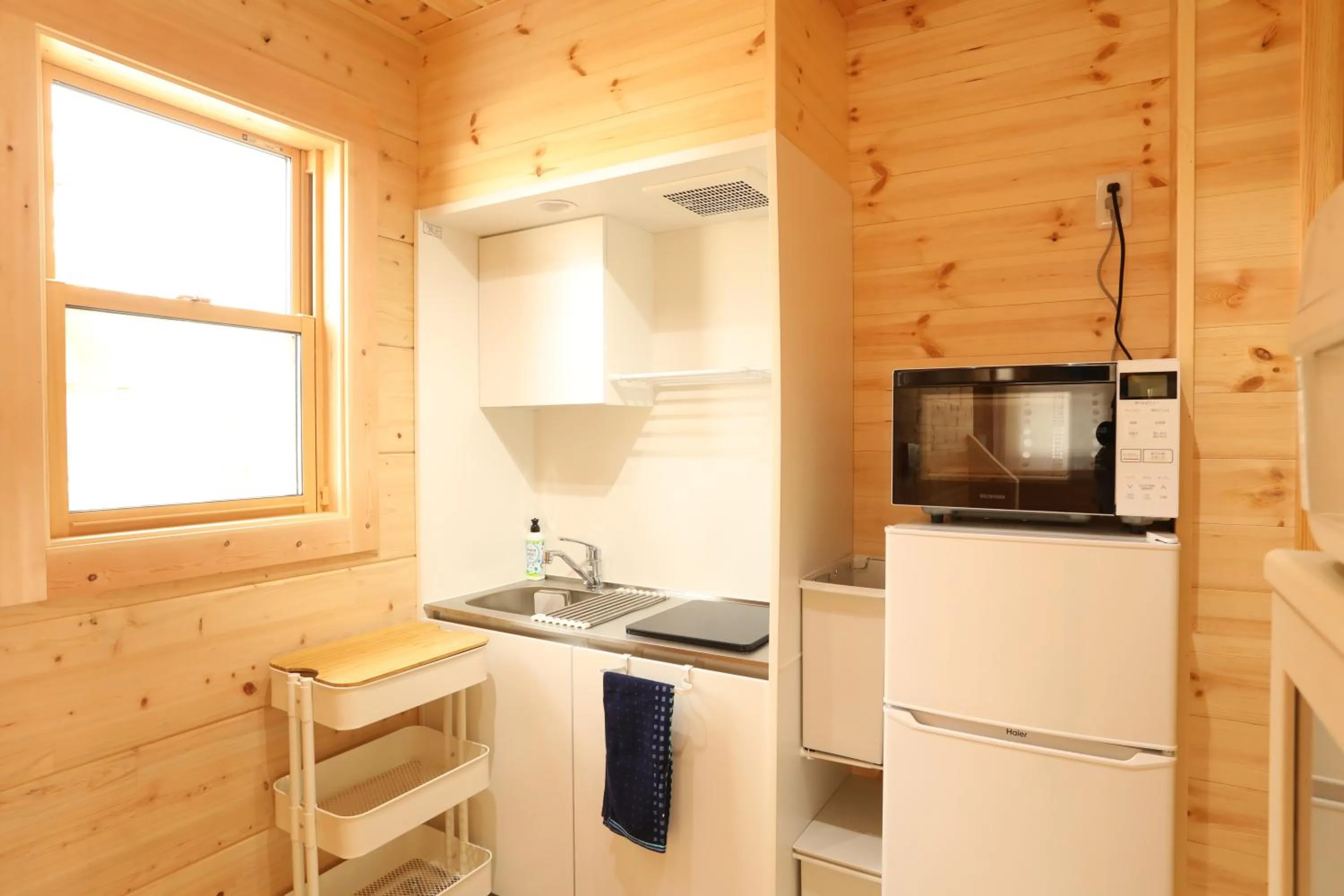 Kitchen or kitchenette in Log Cottage 白馬KIITOS