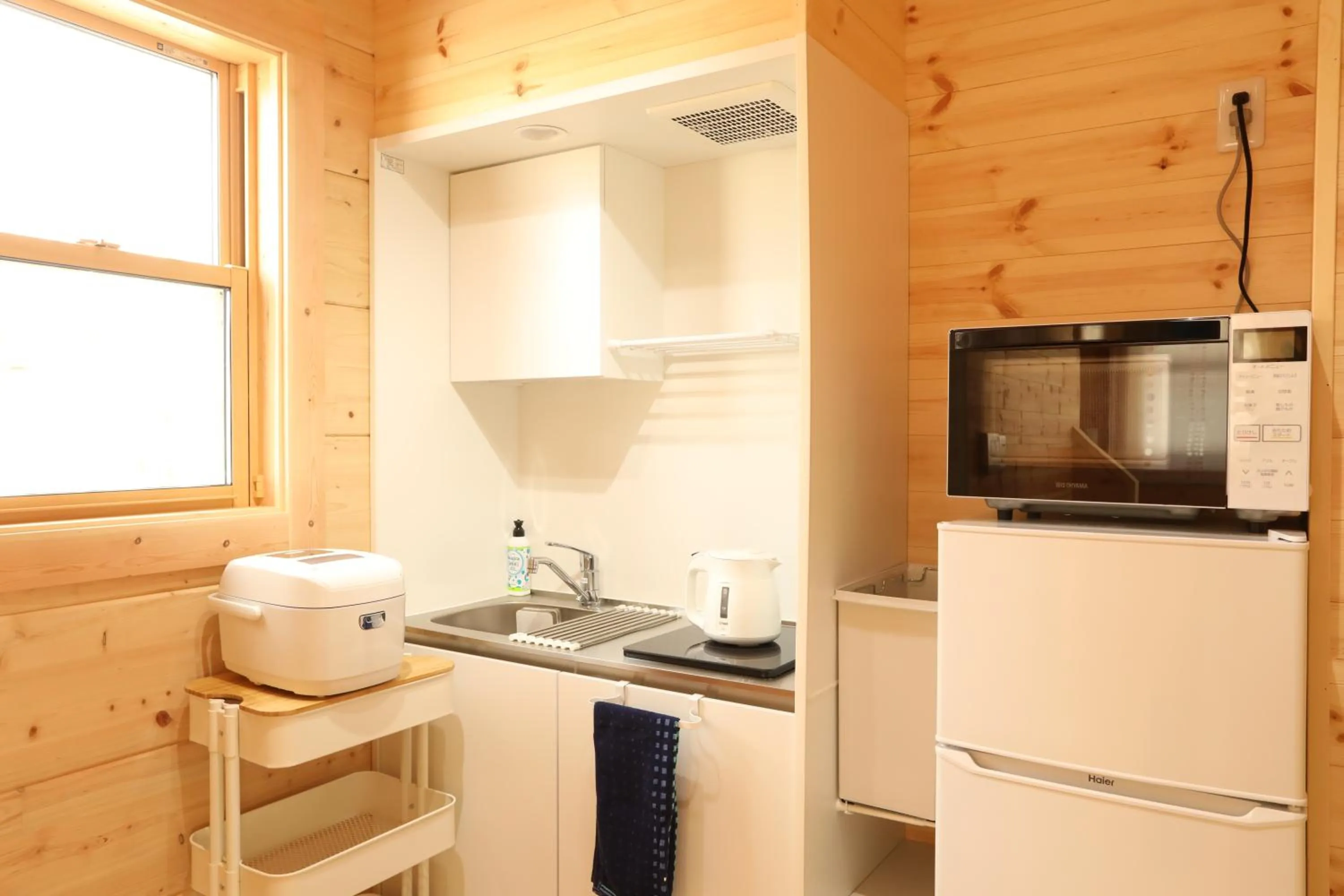 Kitchen or kitchenette in Log Cottage 白馬KIITOS