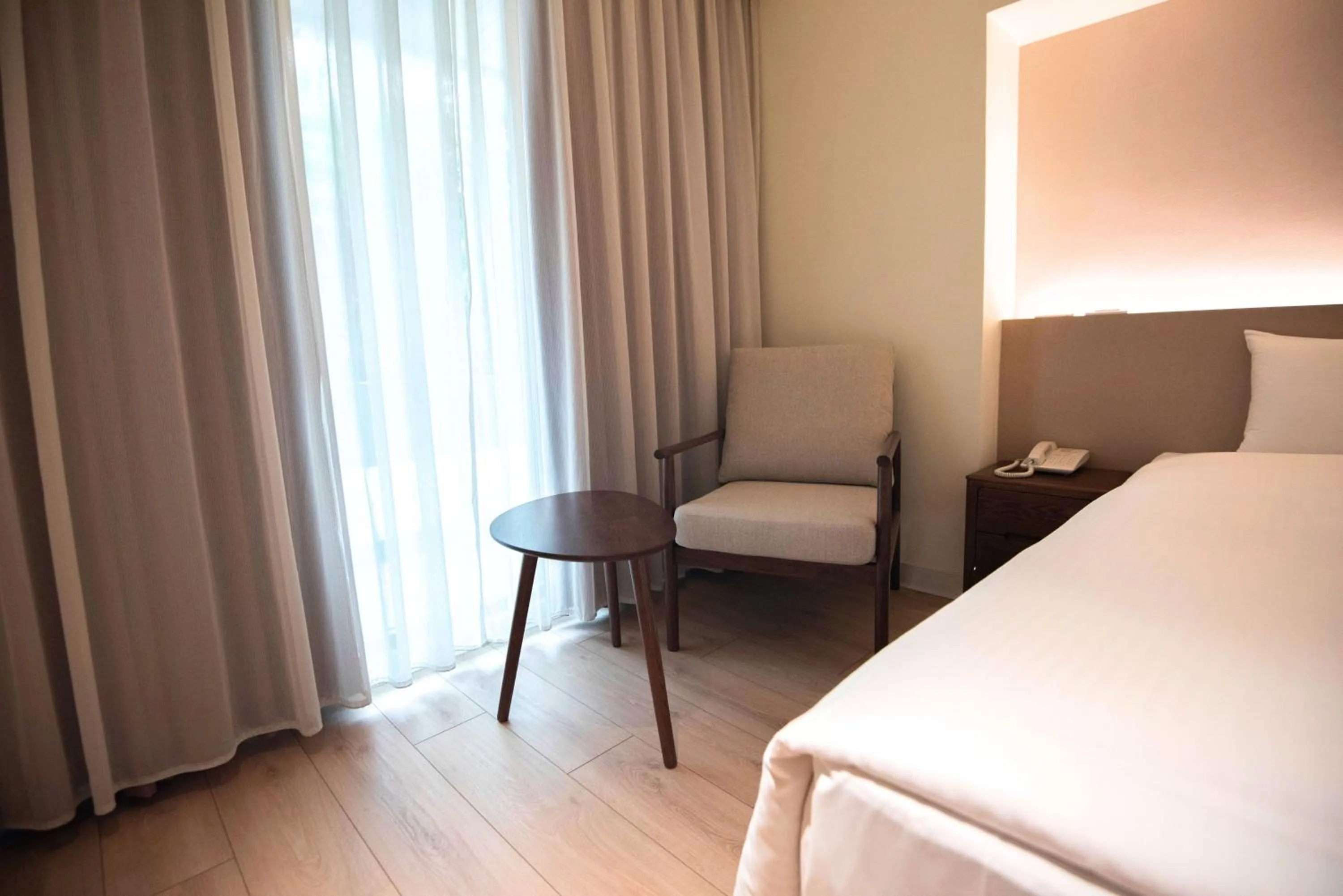 Seating area, Bed in Hotel Tainan