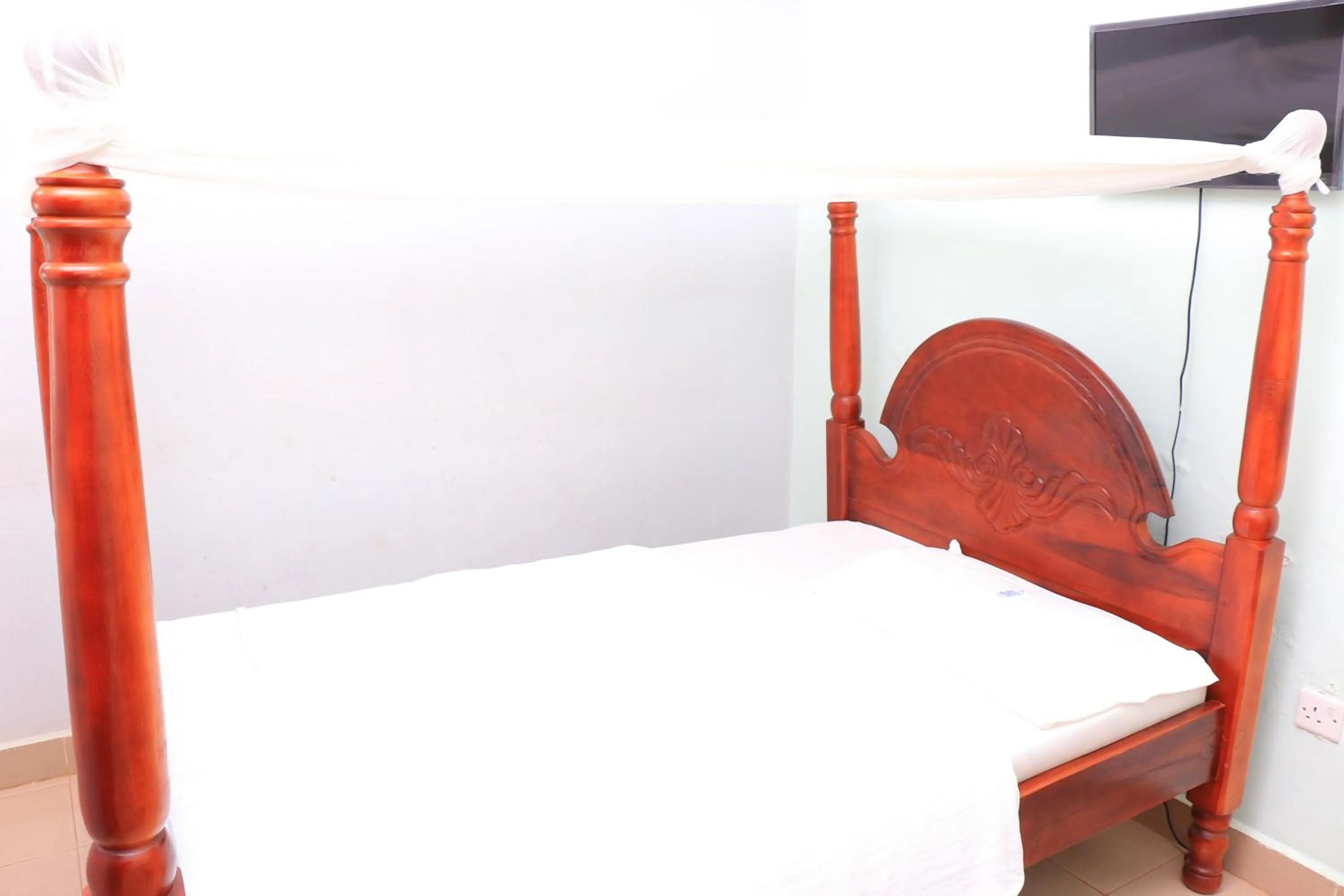 Bed in Marina Terraces Hotel