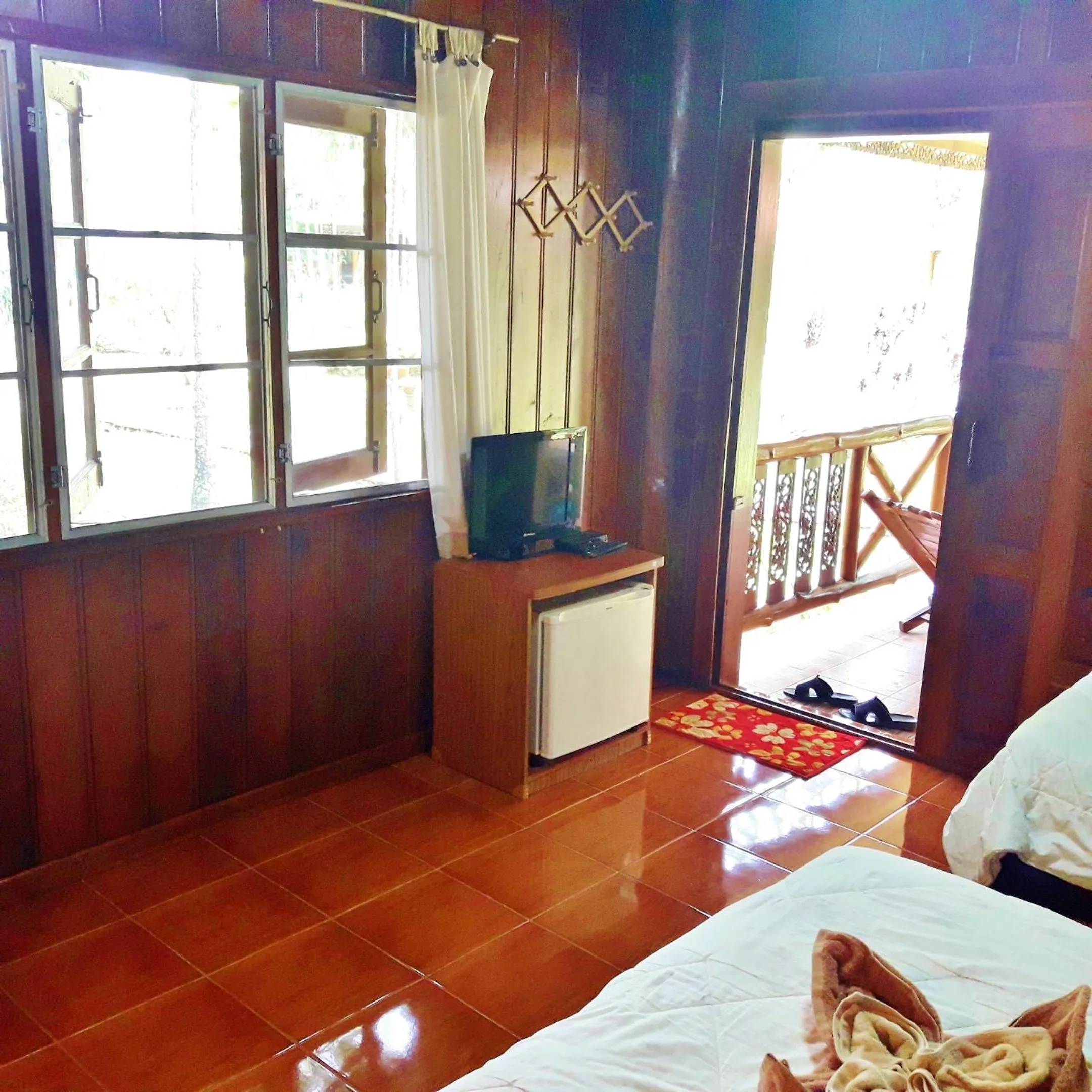 Photo of the whole room, Bed in Huan Chiang Dao Resort