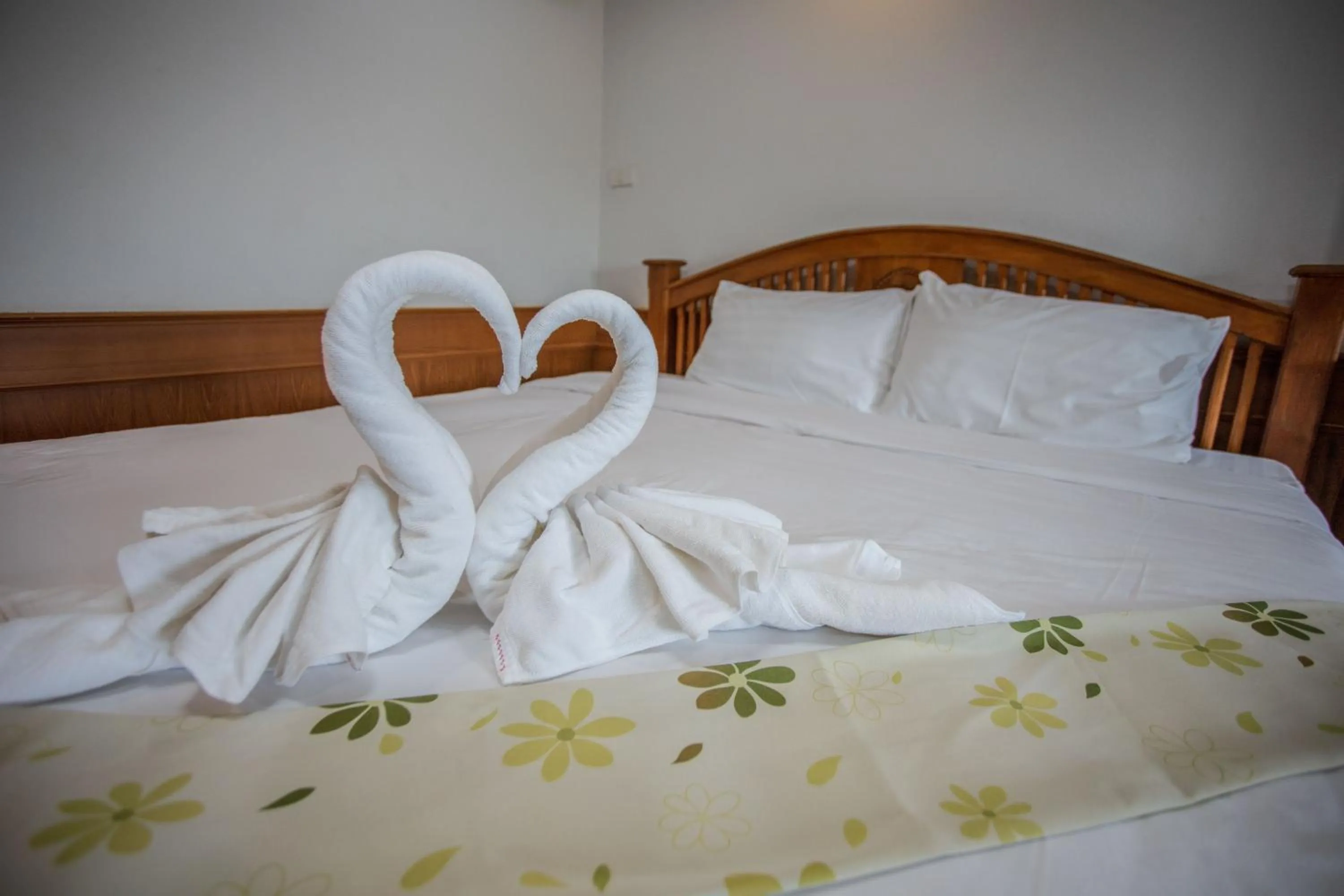 Bed in Siya House Hotel