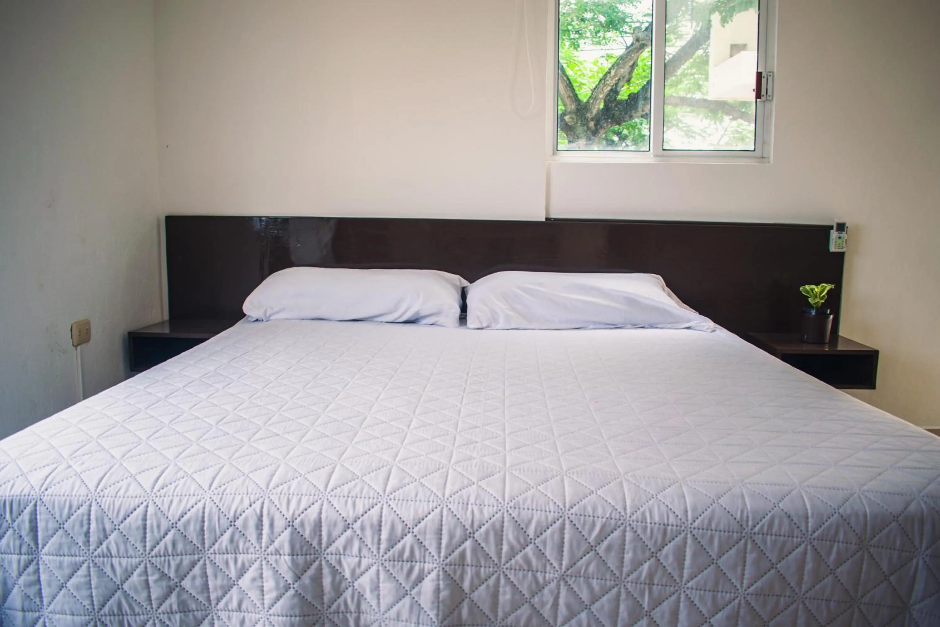 Bed in Hotel Cupules