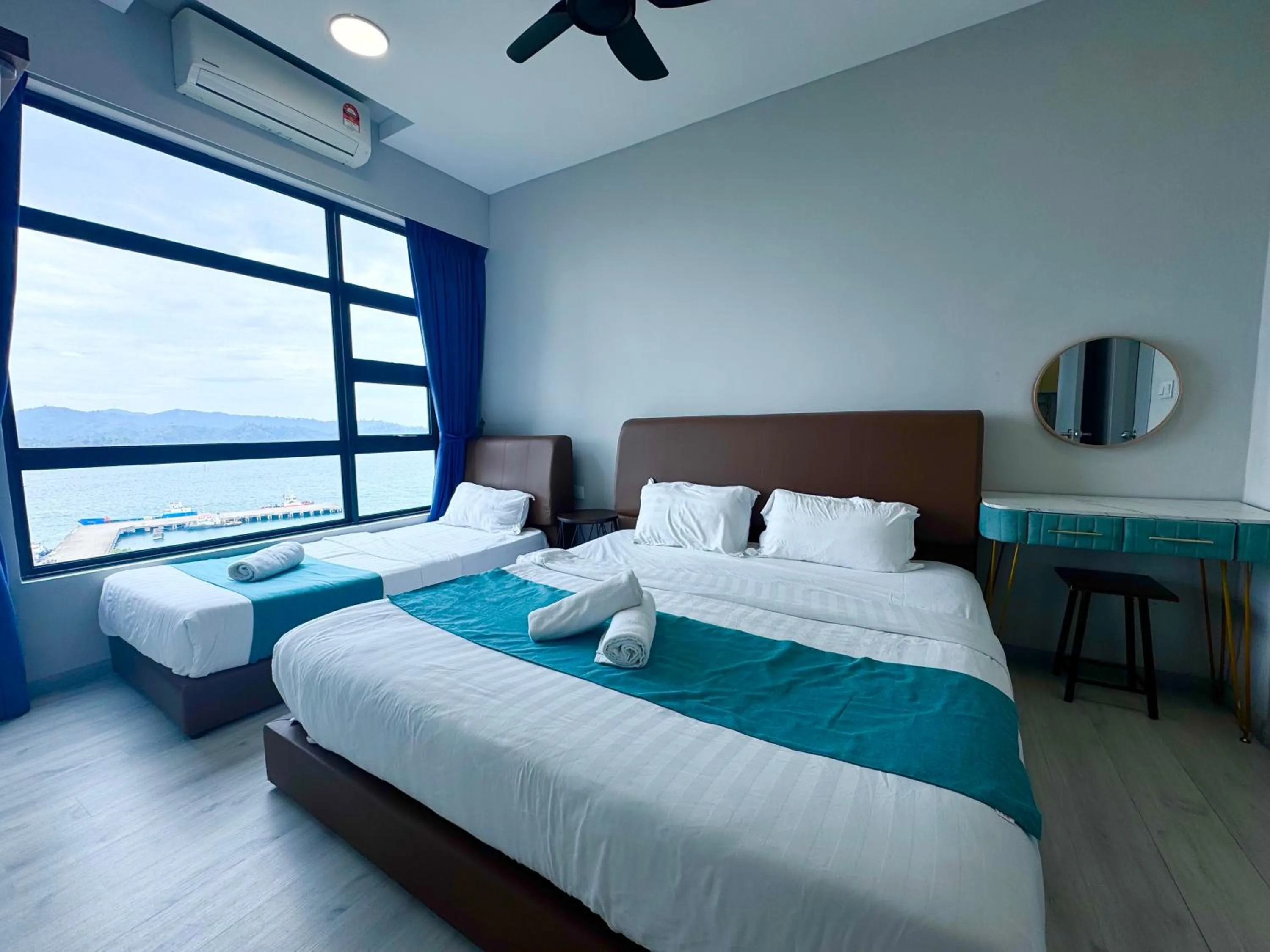 Bed in Sunset Seaview Vacation Condos @ Jesselton Quay