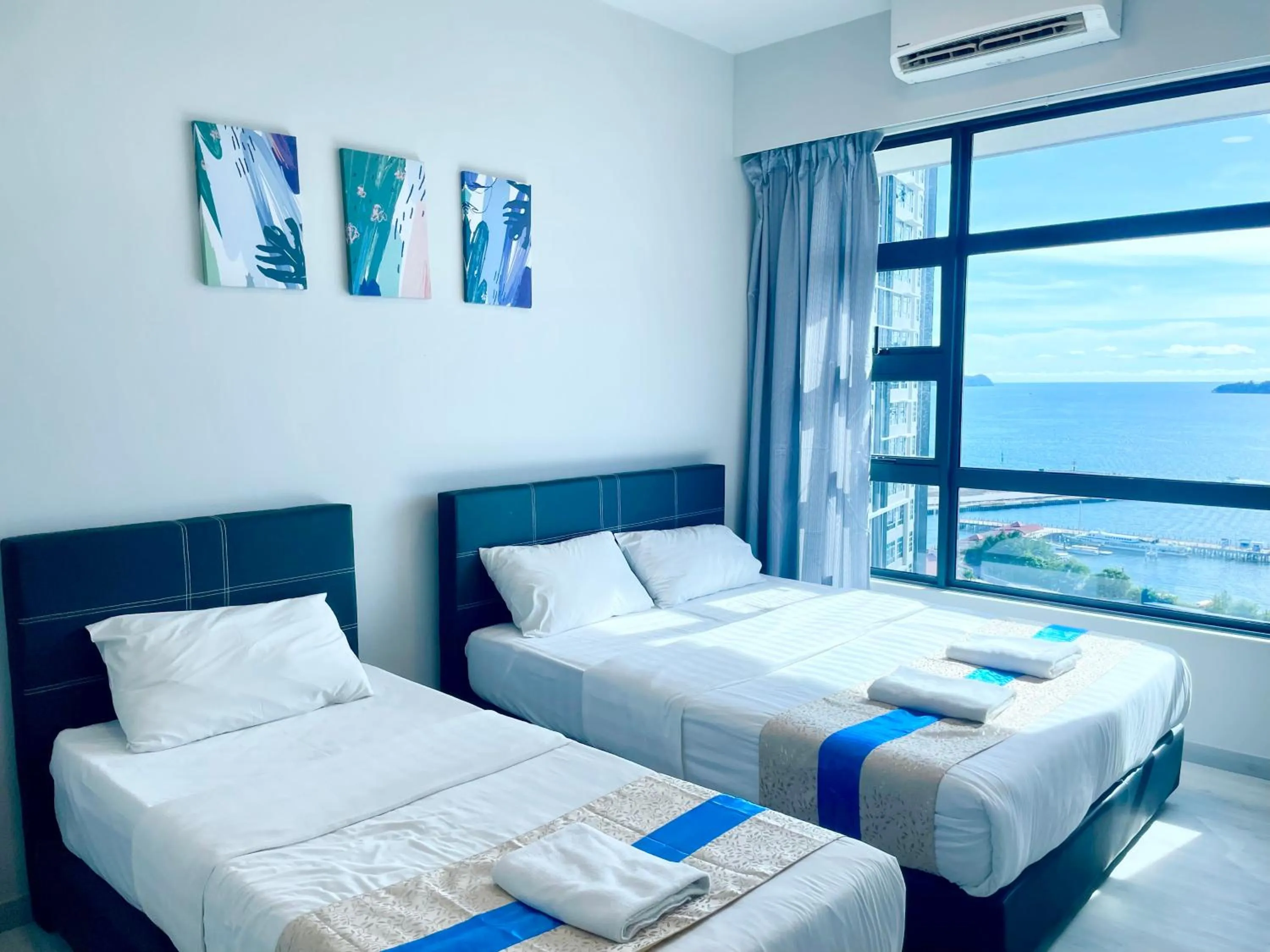 Bed in Sunset Seaview Vacation Condos @ Jesselton Quay