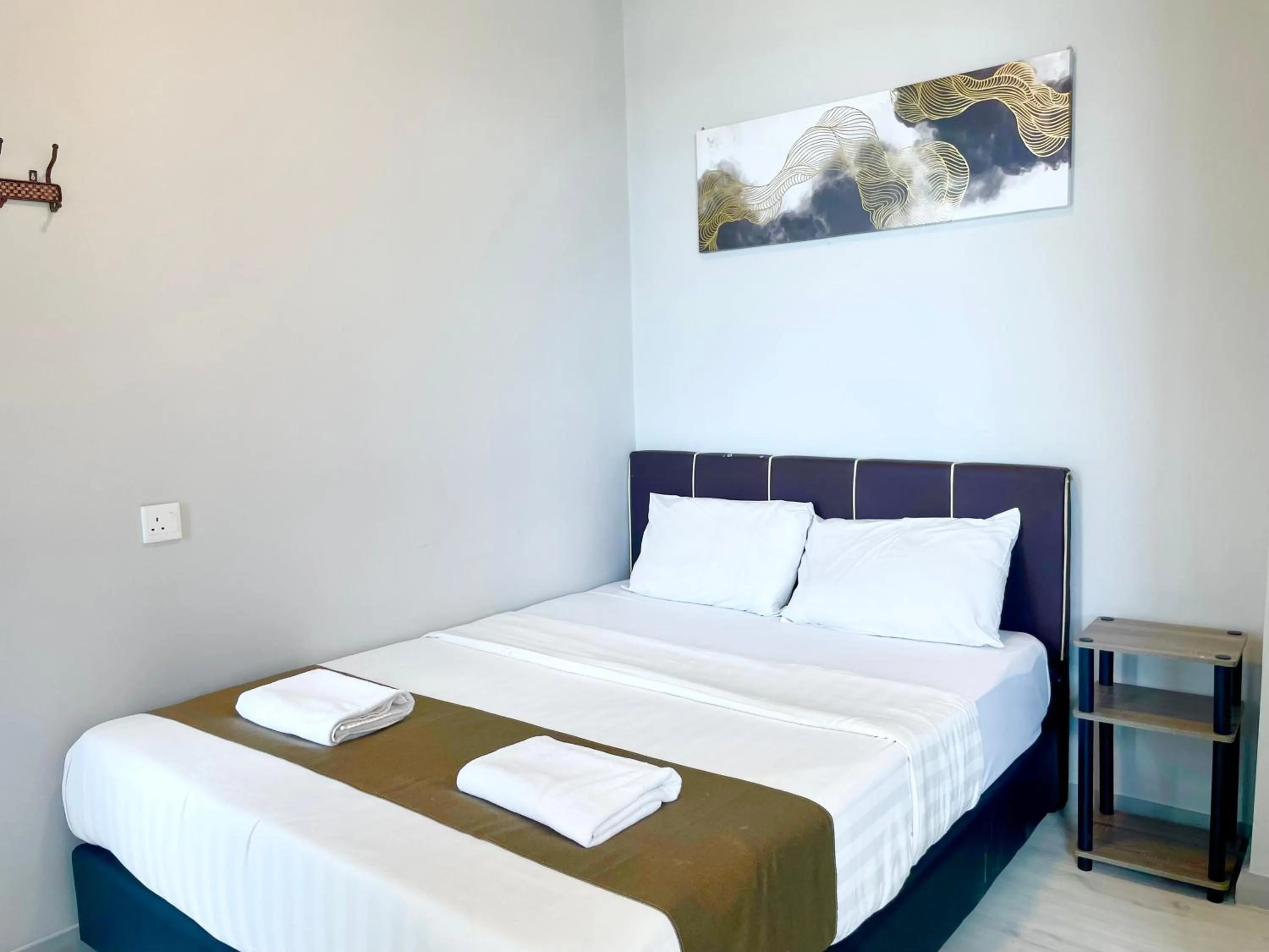 Bed in Sunset Seaview Vacation Condos @ Jesselton Quay