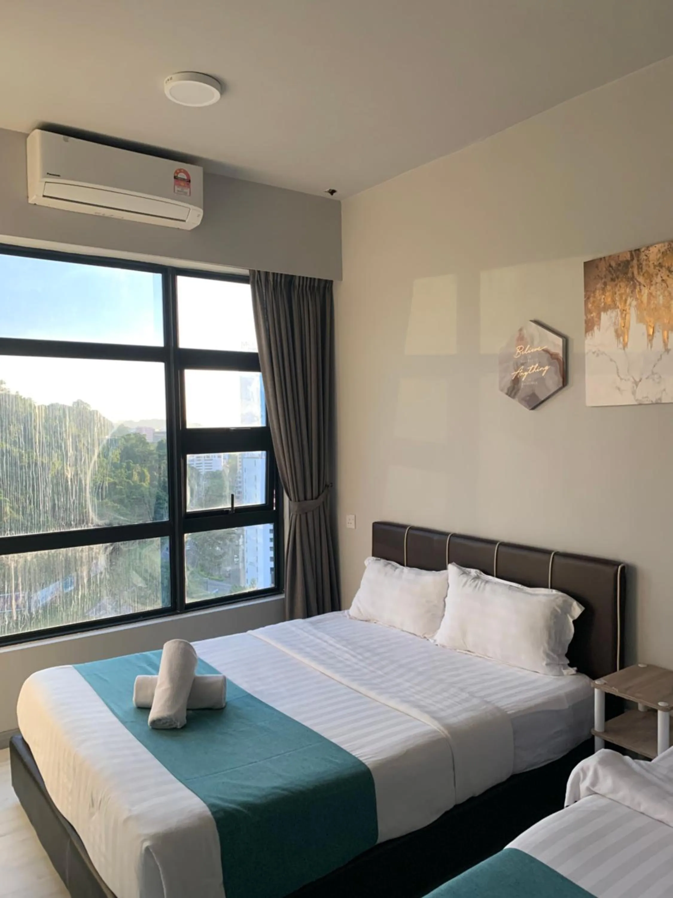 Bed in Sunset Seaview Vacation Condos @ Jesselton Quay