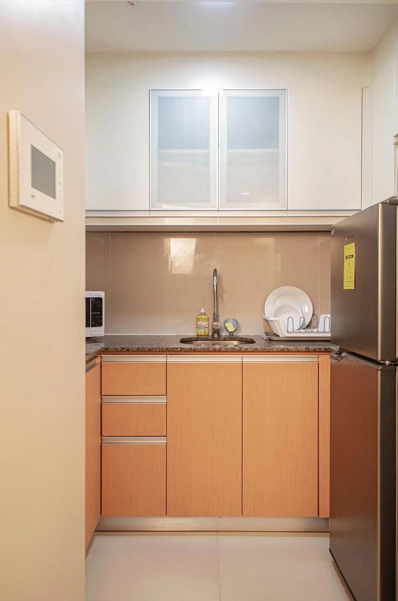 Kitchen or kitchenette in Cozy and Classy Studio Across Airport Terminal 3